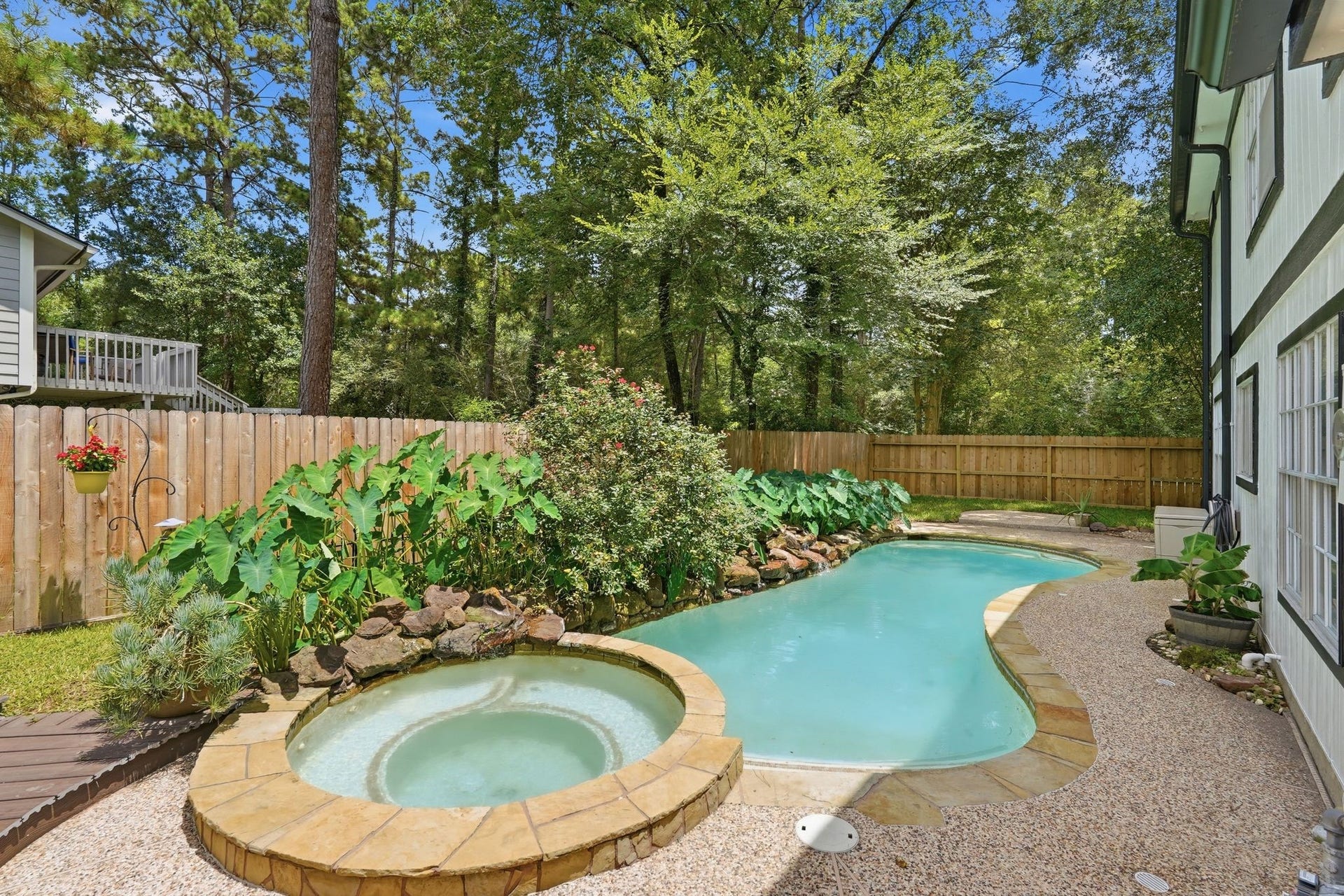 10916 Fawnlily Street, The Woodlands, TX 77380 Check out how relaxing and inviting your pool and spa are. It feels like you're on vacation in your backyard.
