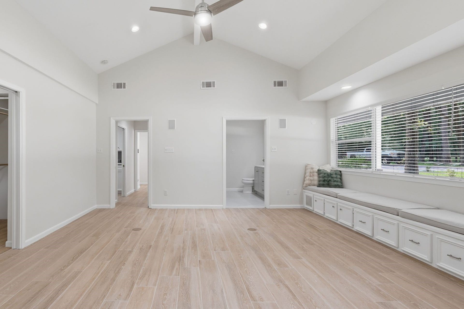 10916 Fawnlily Street, The Woodlands, TX 77380 This bedroom has so much natural light and space to make it your own.