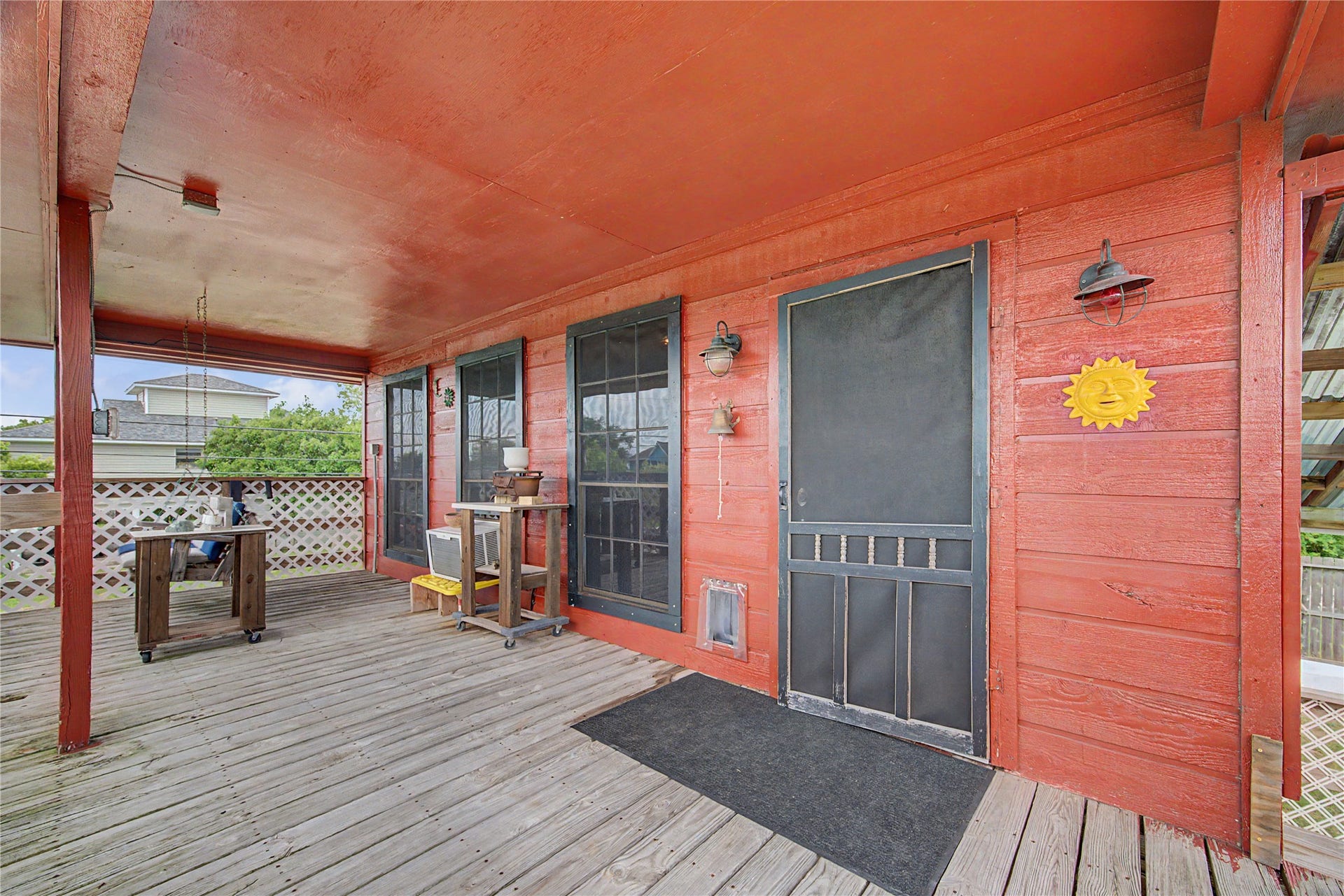 1019 Sunset Drive, San Leon, TX 77539 upstairs porch and entry door into home
