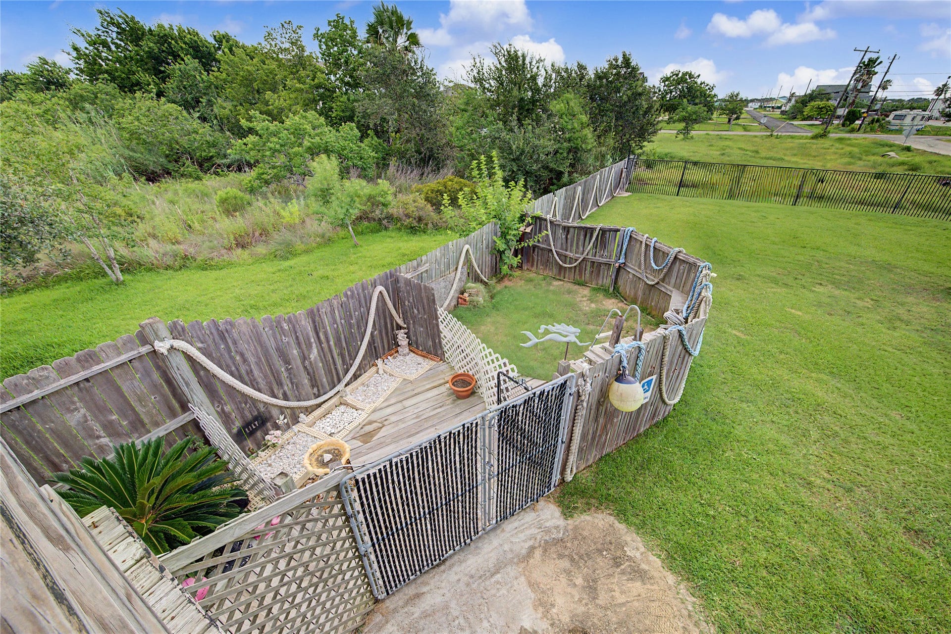 1019 Sunset Drive, San Leon, TX 77539 view of private fenced off areas.