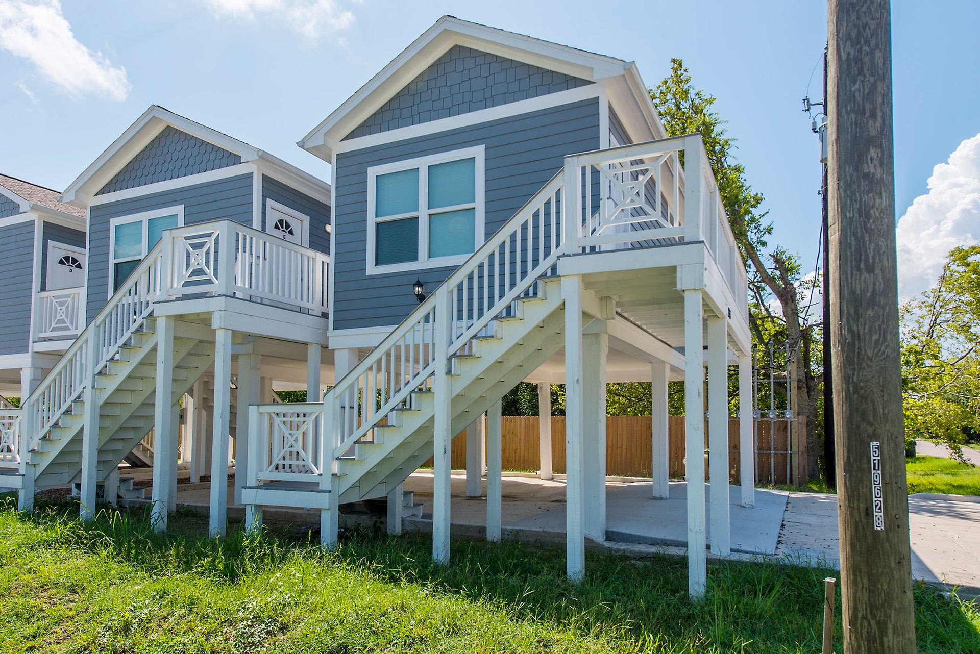 203 6th St, #D, San Leon, TX 77539 Beautiful homes with Hardiplank siding and rain gutters.