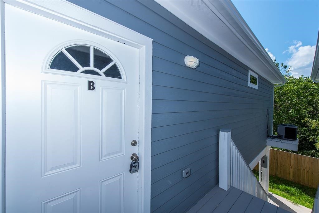 203 6th St, #D, San Leon, TX 77539 Front door of unit B.