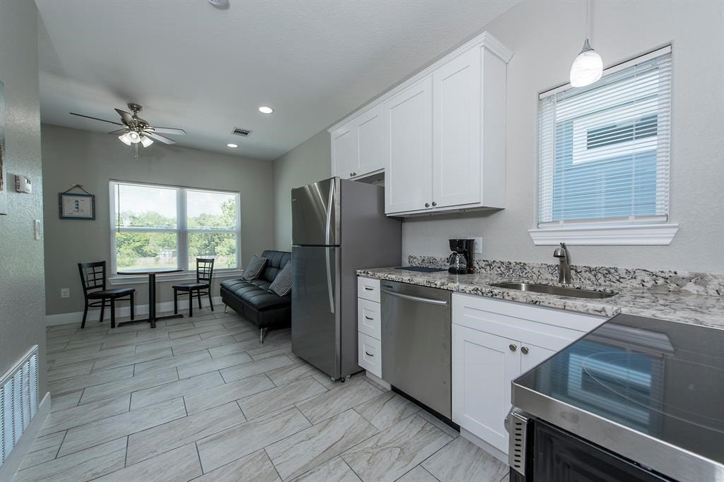203 6th St, #D, San Leon, TX 77539 Double Paned Windows & Interior Blinds. Raised panel doors too.