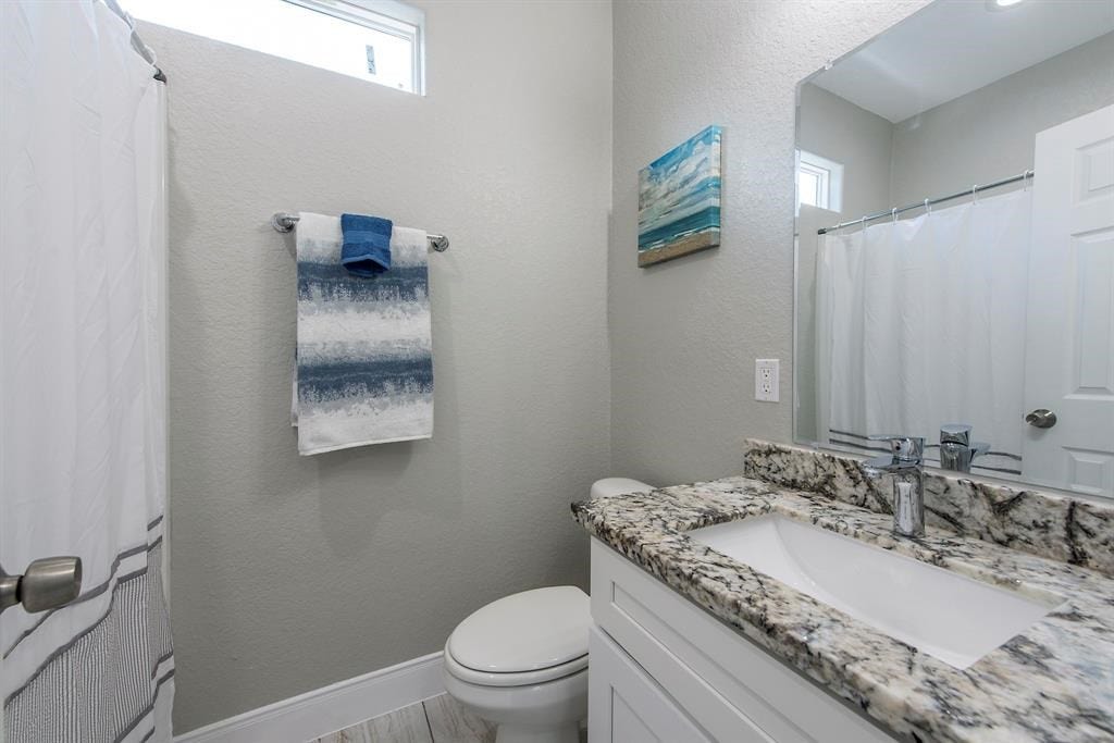 203 6th St, #D, San Leon, TX 77539 Bathroom with granite countertop, & undermount sink.