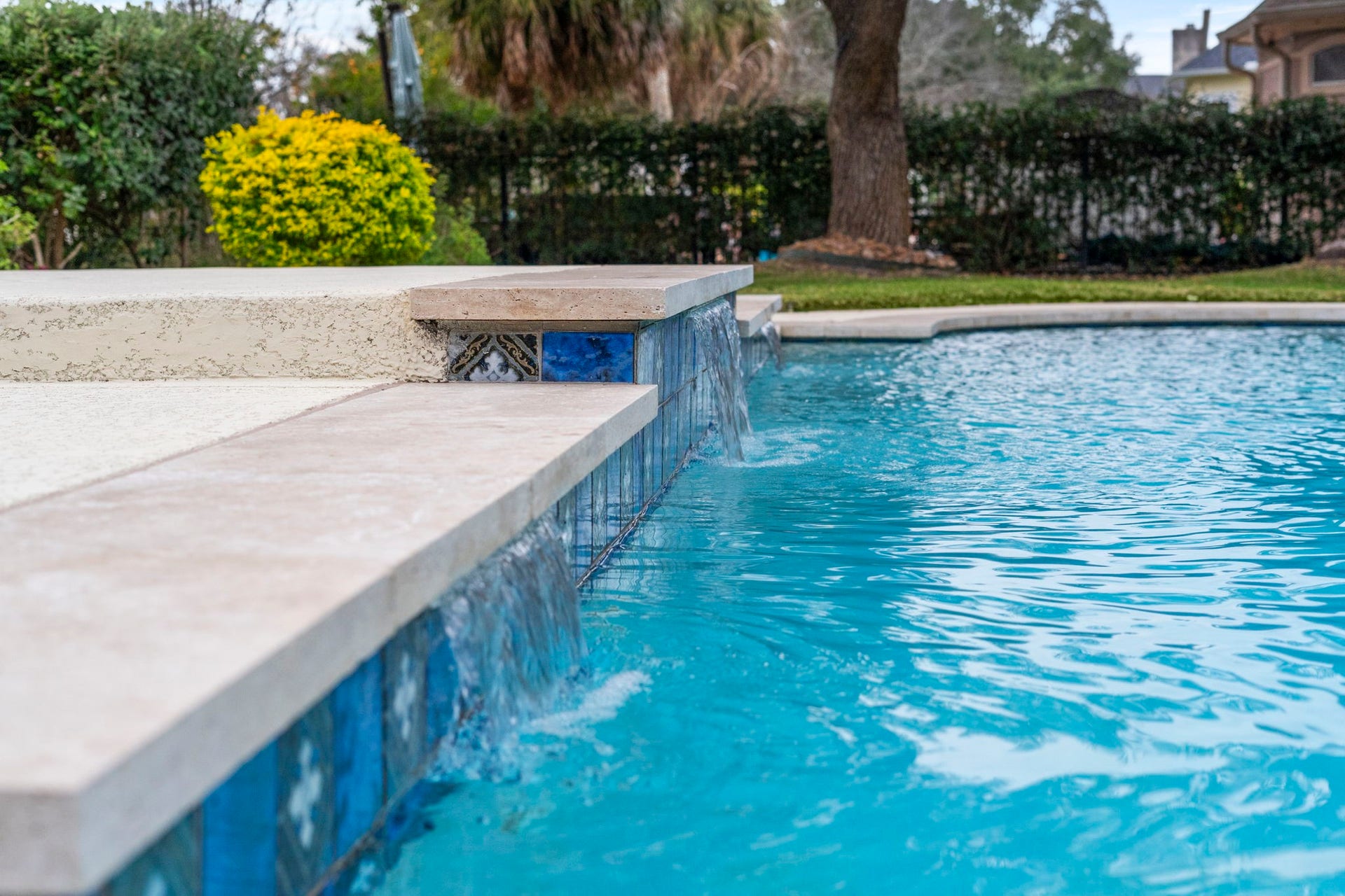 7322 Greatwood Lake Drive, Sugar Land, TX 77479 Water scupper features add to the serenity