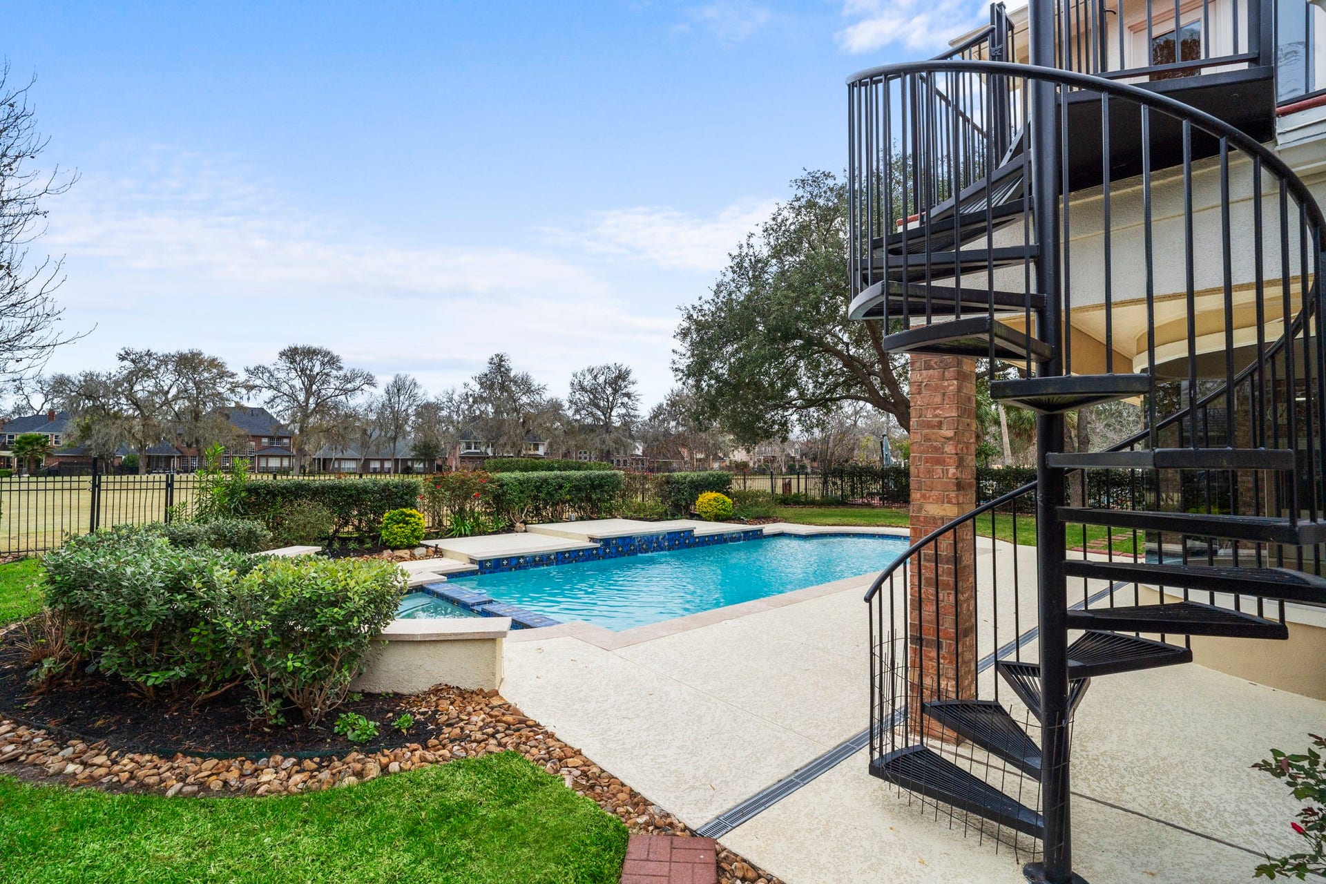 7322 Greatwood Lake Drive, Sugar Land, TX 77479 Spiral staircase leads to Game Room