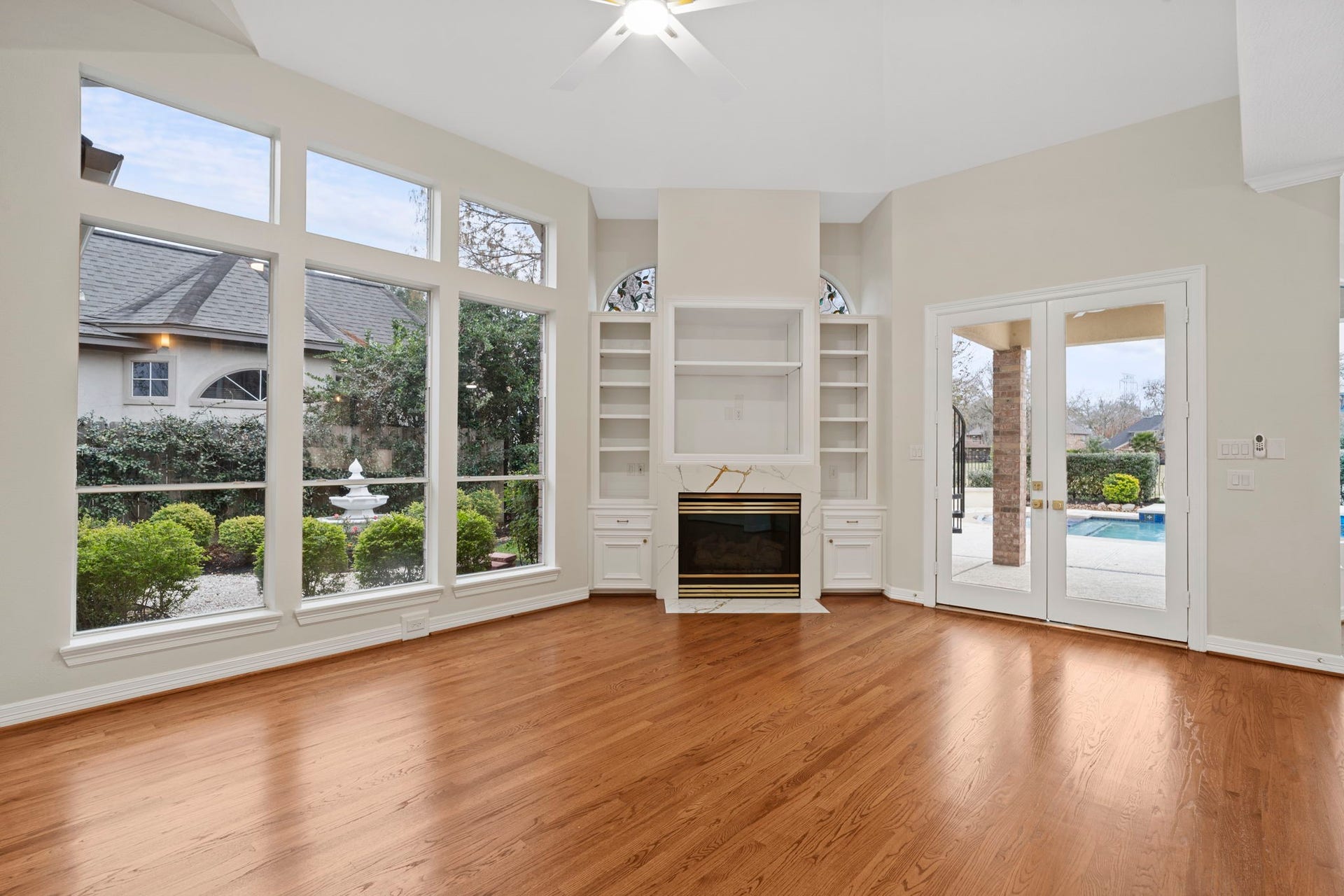 7322 Greatwood Lake Drive, Sugar Land, TX 77479 Enjoy watching the game with garden and pool backdrop views