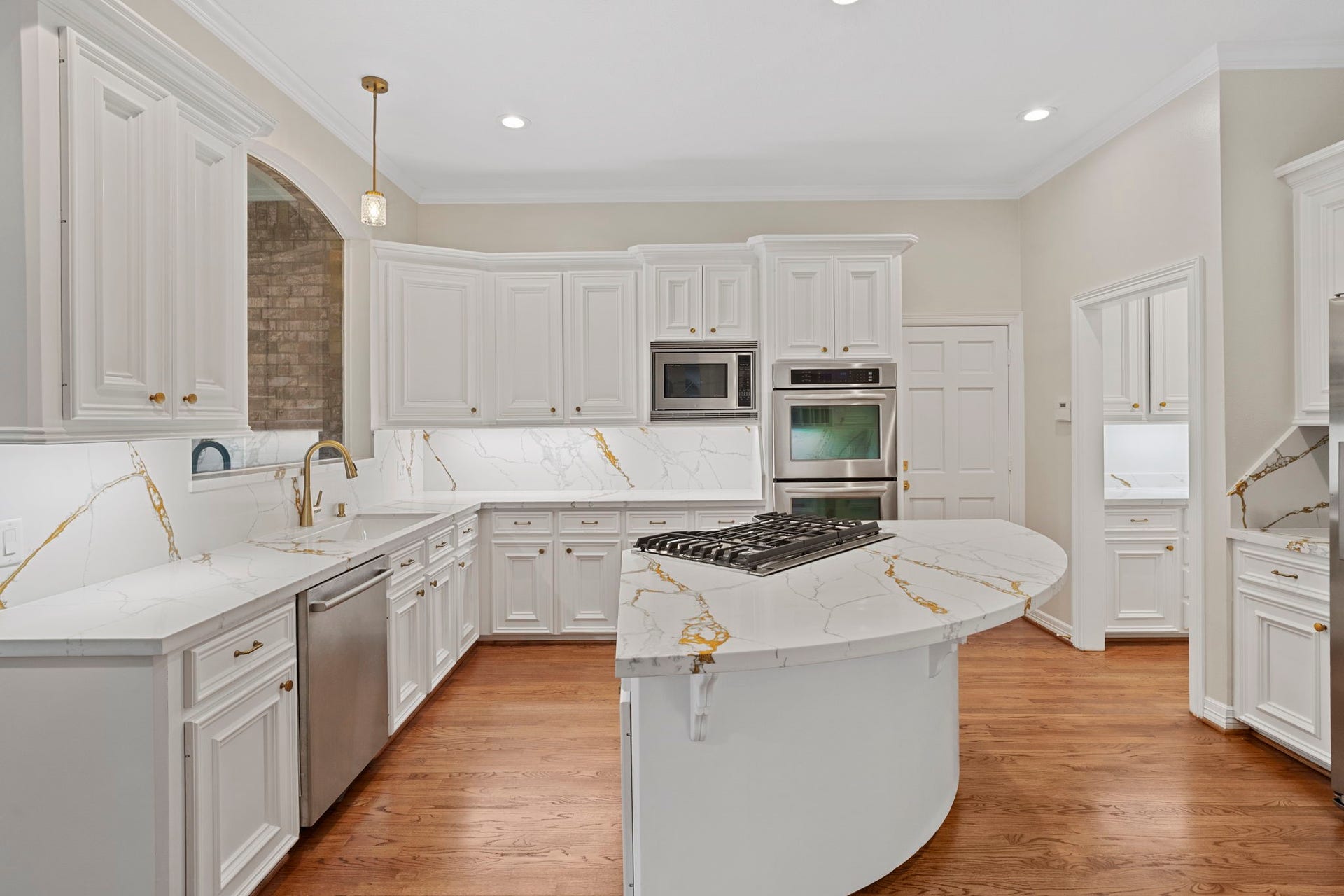 7322 Greatwood Lake Drive, Sugar Land, TX 77479 Tons of freshly painted cabinets for all your kitchen storage desires...with under cabinet lighting and plugs of course