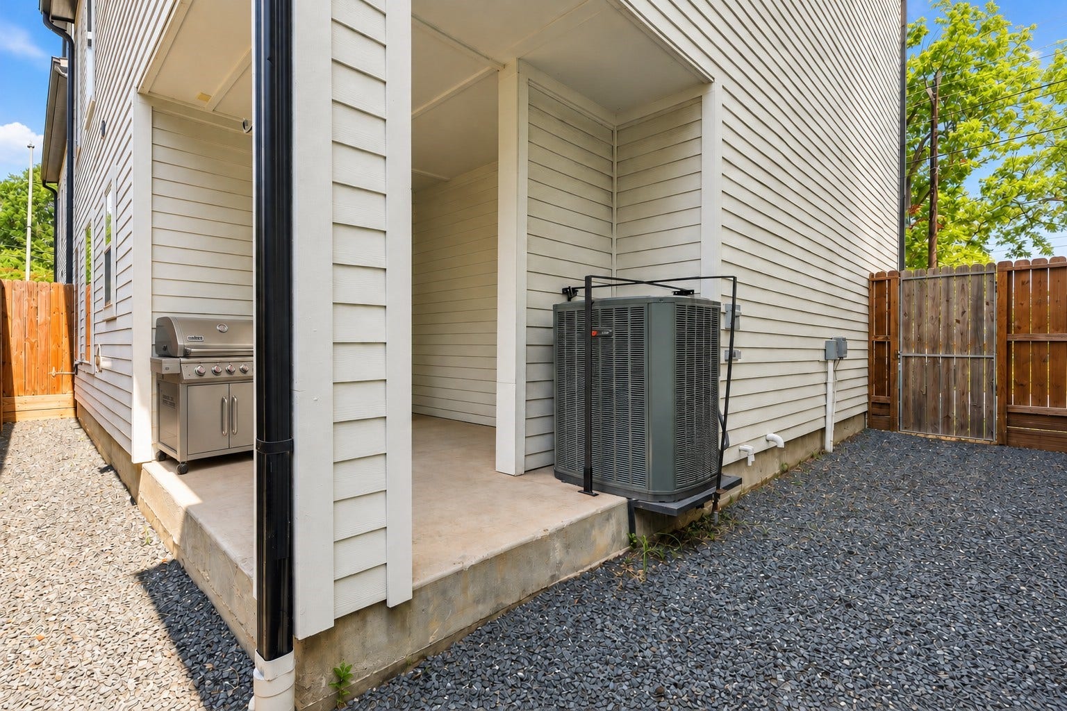 3109 Arlington Street, Houston, TX 77018 Virtually Staged Grill: Pet-friendly outdoor space featuring a dedicated pet area and a natural gas hookup on the wall, providing a convenient option for connecting a gas grill.