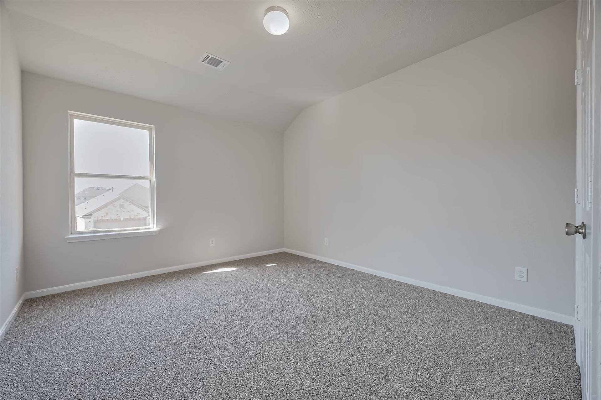 24114 Morrison Lane, Katy, TX 77493 Bedroom with neutral walls and a carpeted floor.