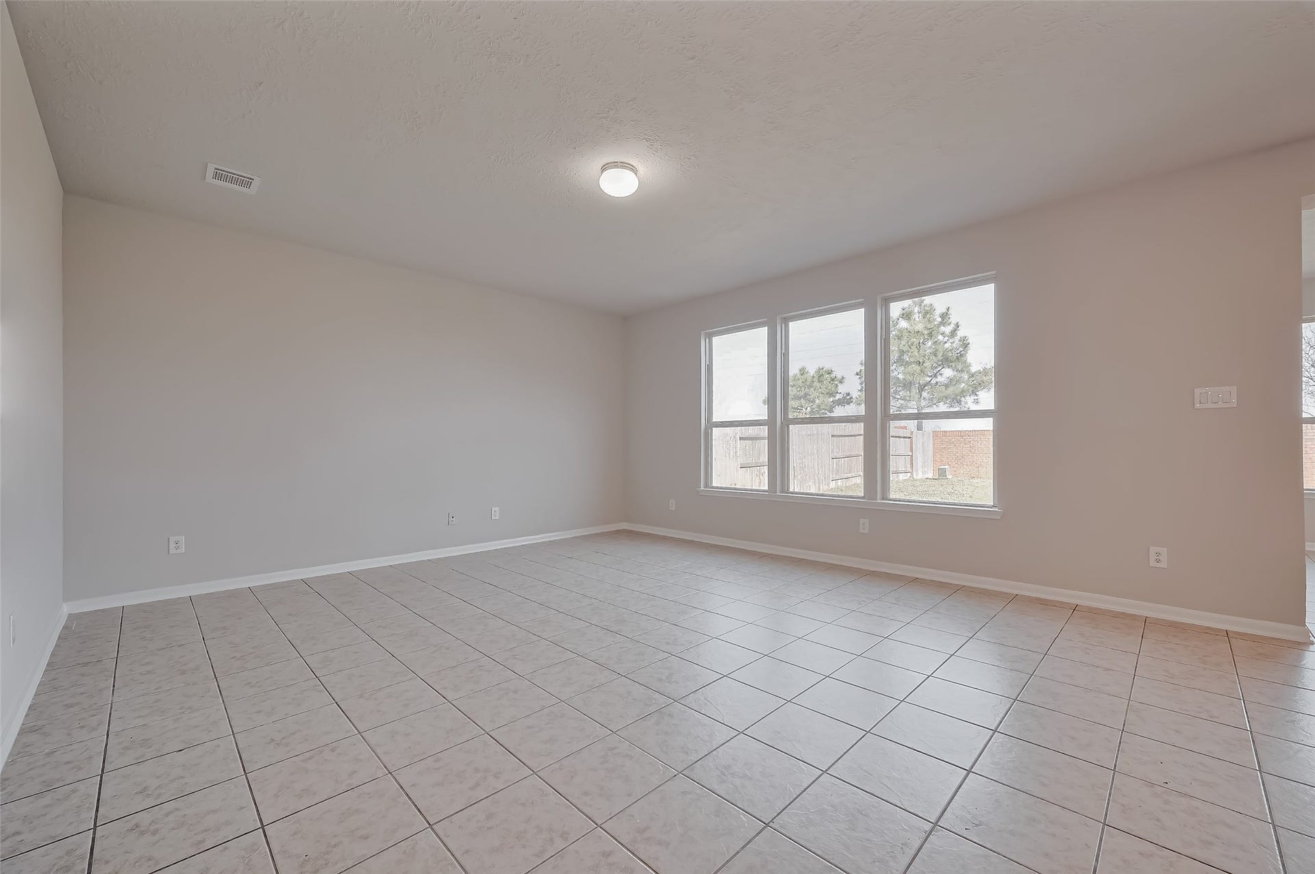 24114 Morrison Lane, Katy, TX 77493 Living room with large windows.