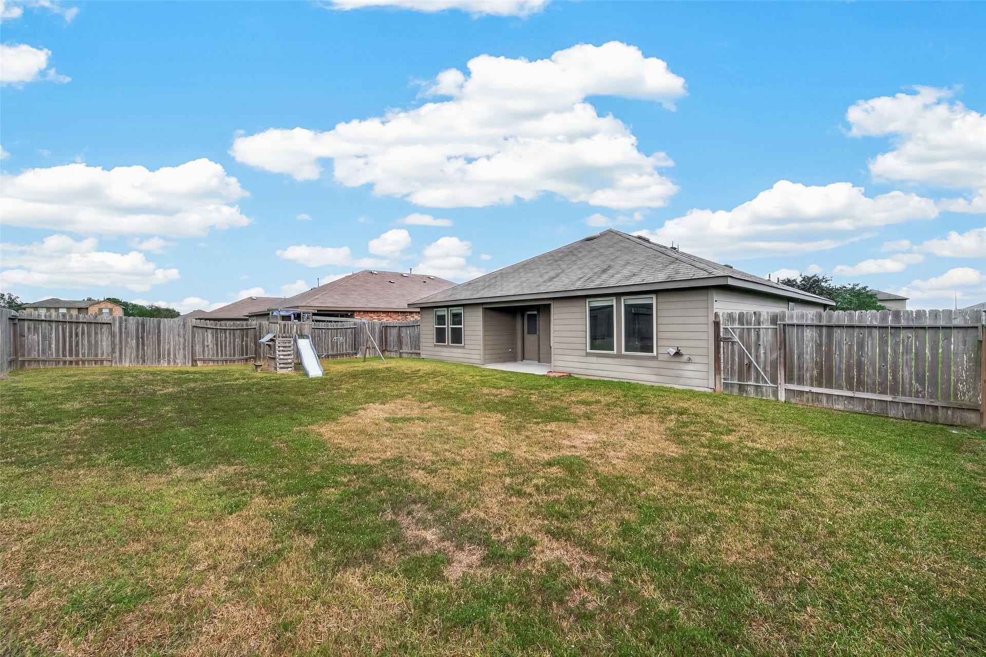 1714 Cooper Bluff Court, Rosenberg, TX 77469 Back yard has ample place for your children and pets to run around.