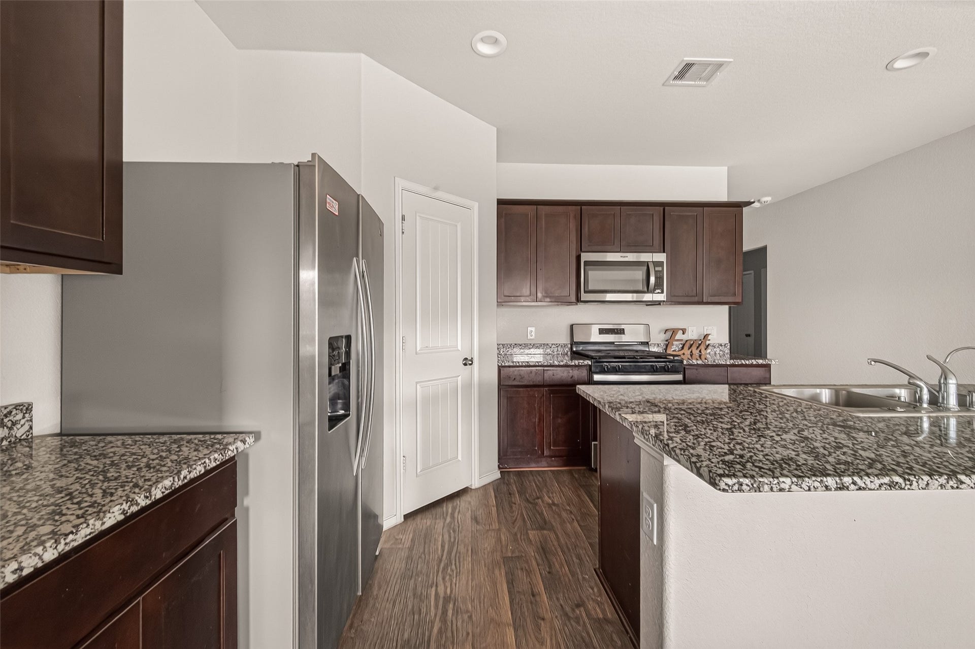 1714 Cooper Bluff Court, Rosenberg, TX 77469 Refrigerator included in the price.