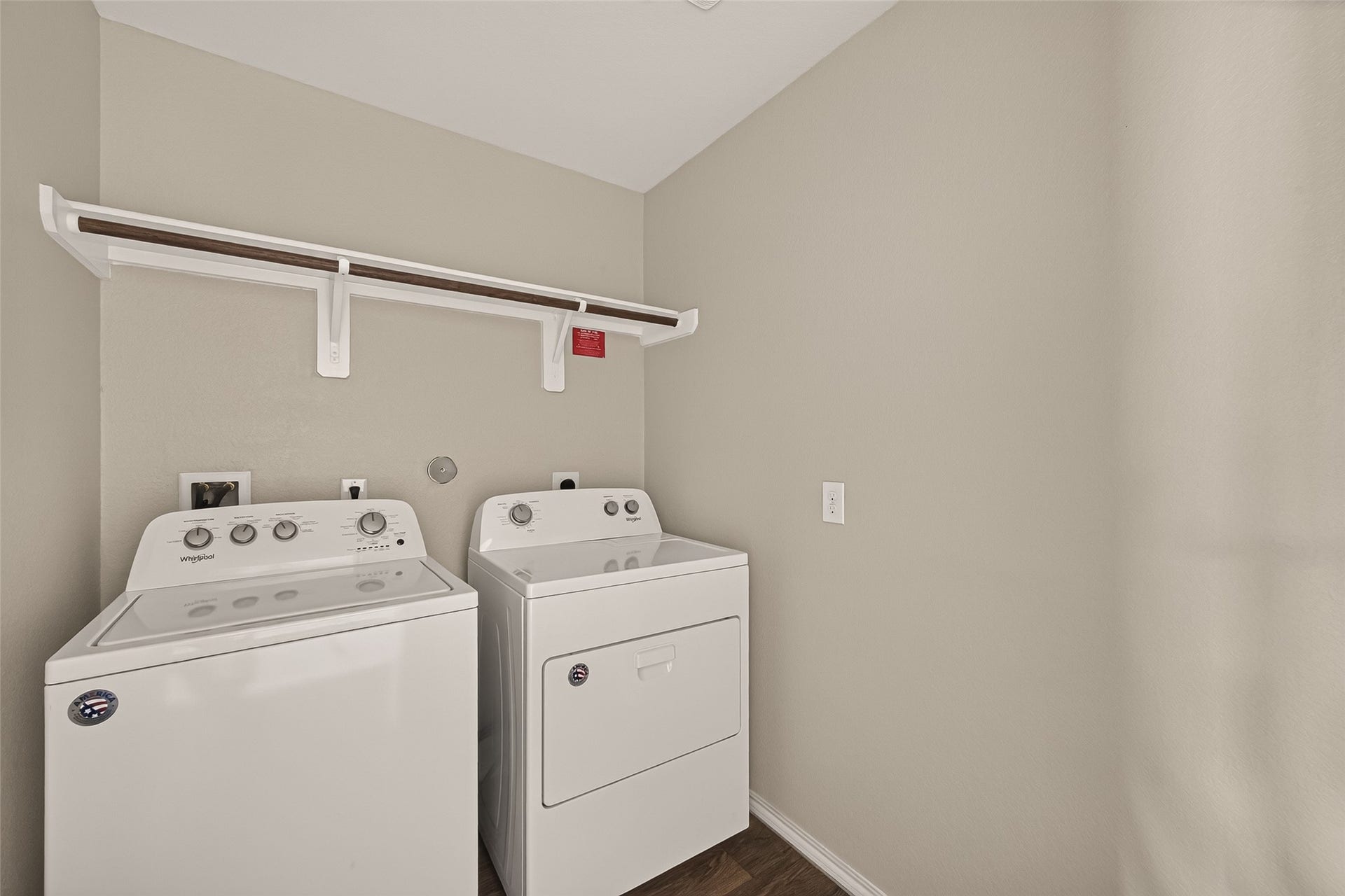 1714 Cooper Bluff Court, Rosenberg, TX 77469 Washer & Dryer in house utility area.
