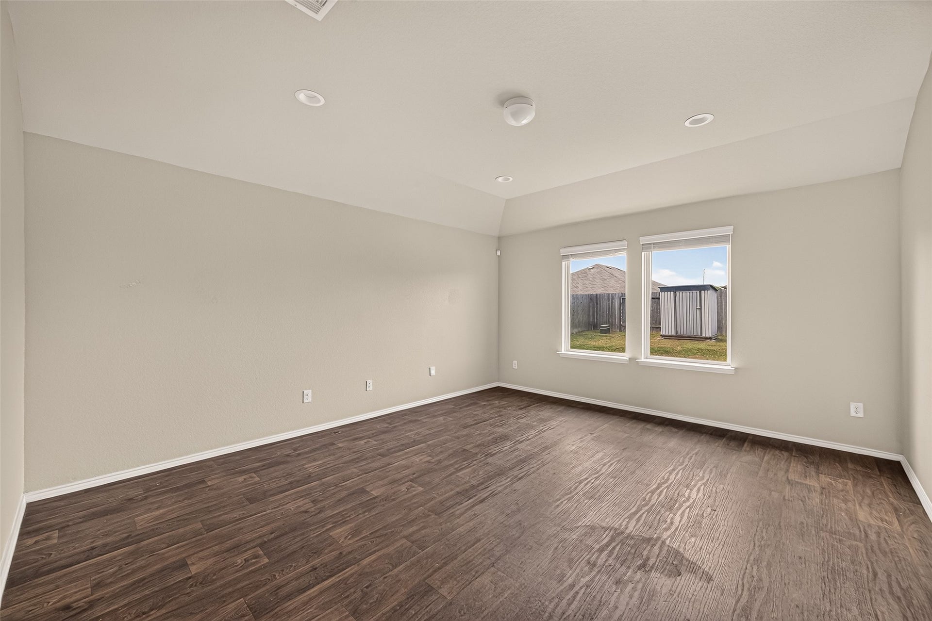 1714 Cooper Bluff Court, Rosenberg, TX 77469 Living room has vinyl flooring.