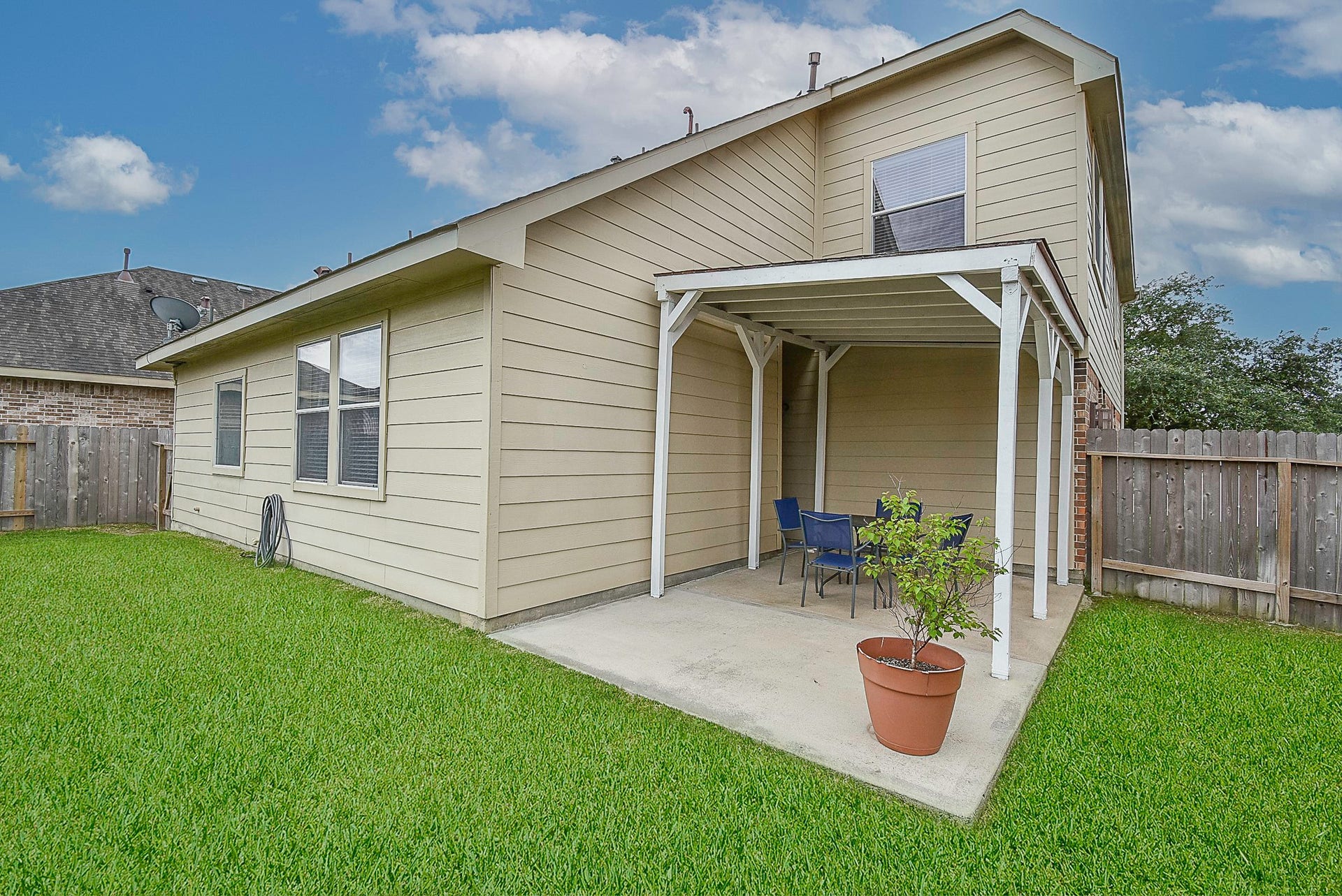 3615 Morning Gale Lane, Katy, TX 77494 Relax under the convenient covered back patio overlooking the backyard.