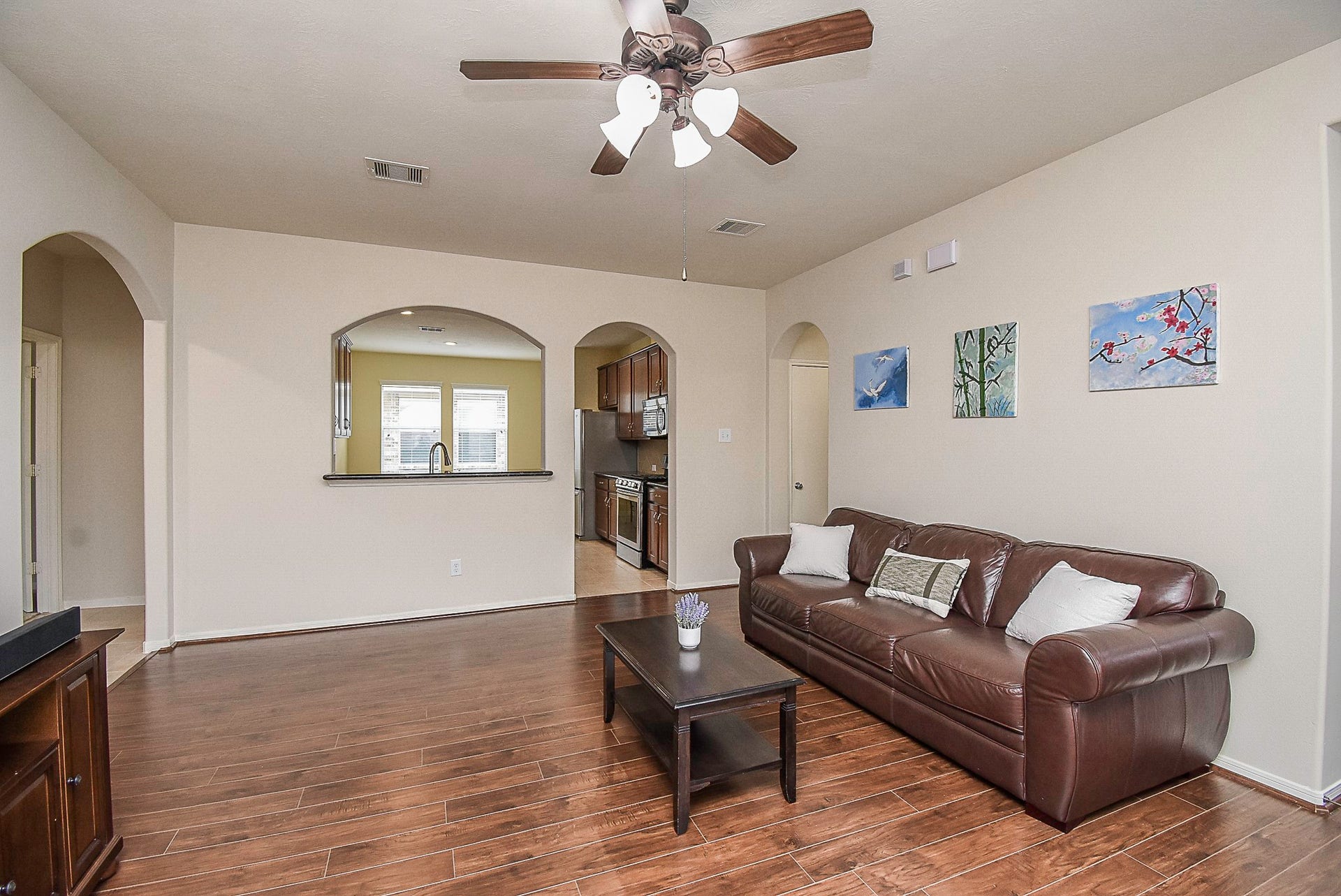 3615 Morning Gale Lane, Katy, TX 77494 An open layout keeps the living room connected to the kitchen.