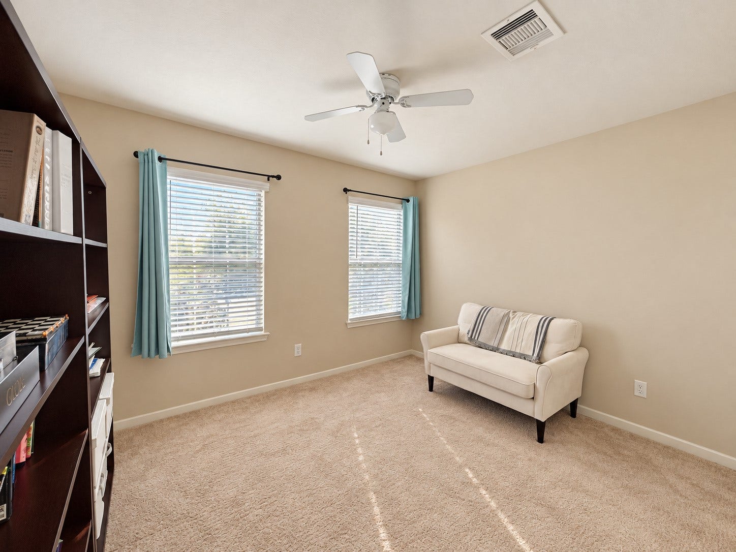 3615 Morning Gale Lane, Katy, TX 77494 Spacious fourth bedroom featuring a ceiling fan and multiple windows for natural light.