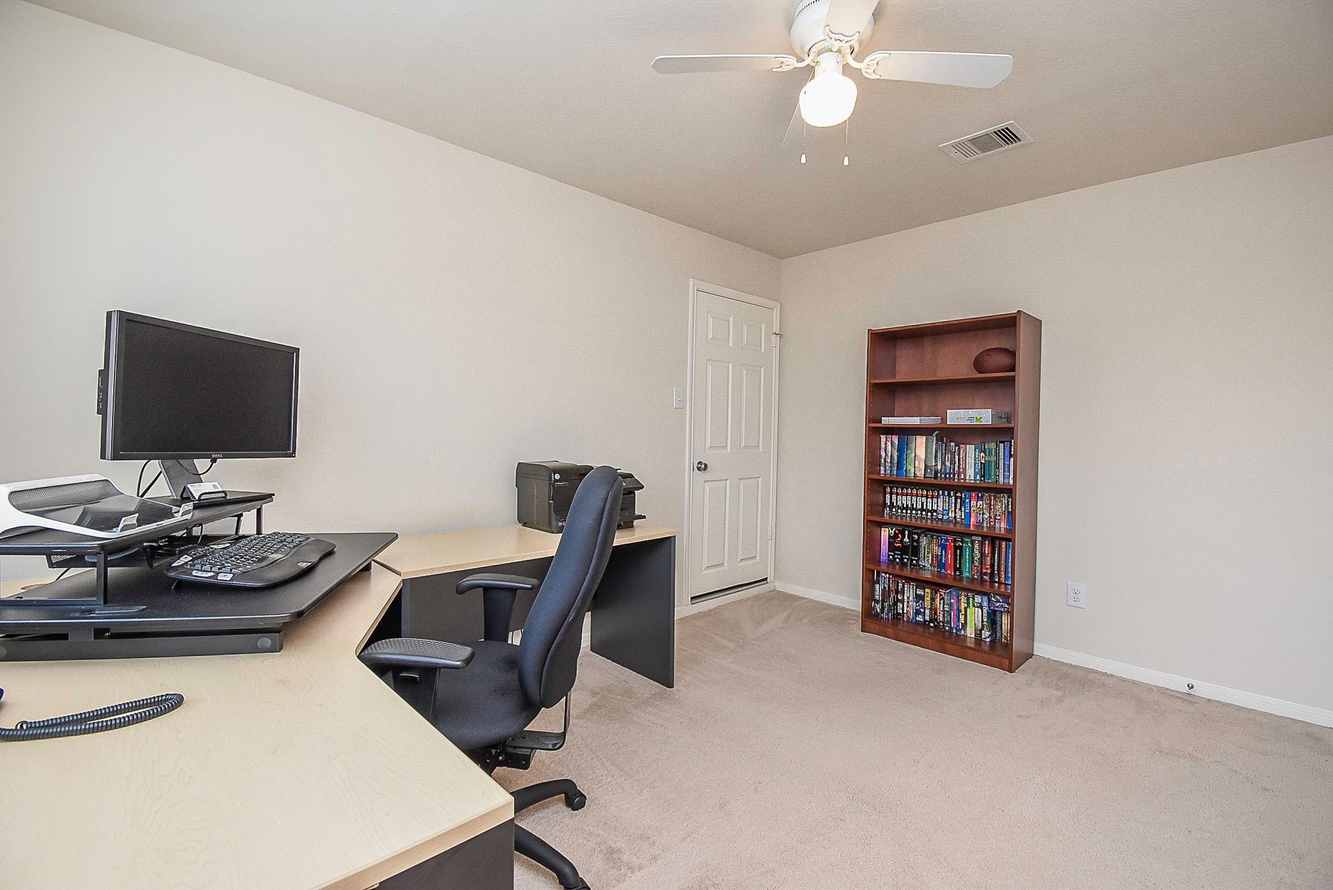 3615 Morning Gale Lane, Katy, TX 77494 Spacious third bedroom with a ceiling fan and plenty of room to make the space your own.