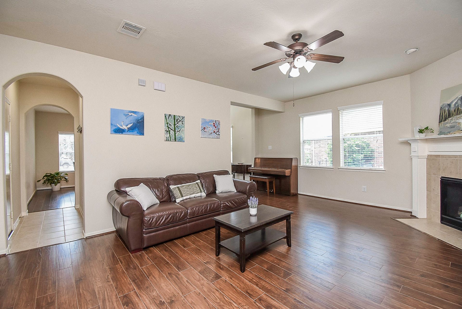 3615 Morning Gale Lane, Katy, TX 77494 Unwind in the expansive living room, complete with a ceiling fan and plenty of natural light.