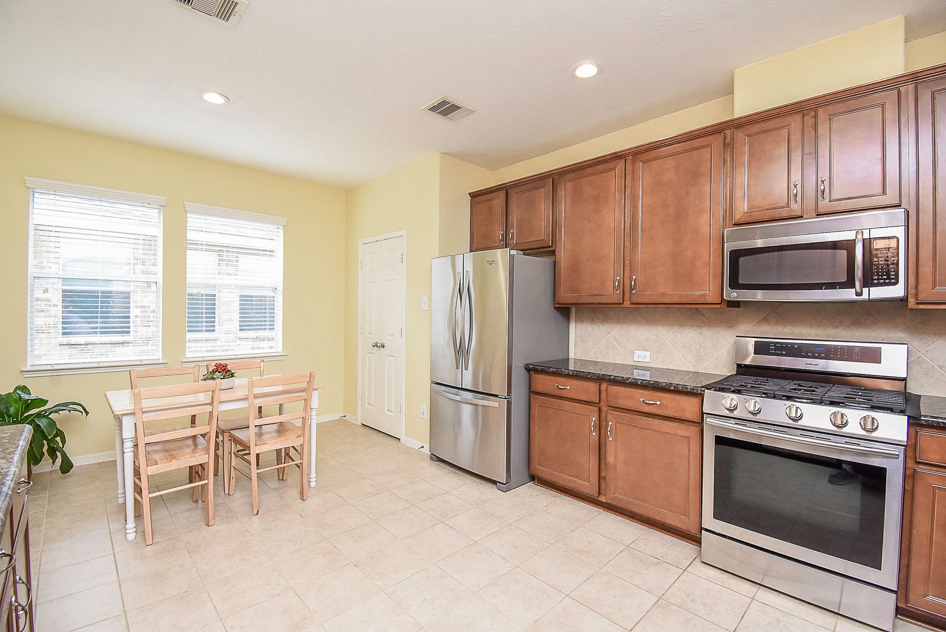 3615 Morning Gale Lane, Katy, TX 77494 Stainless steel appliances and tile floors make for easy cleaning.