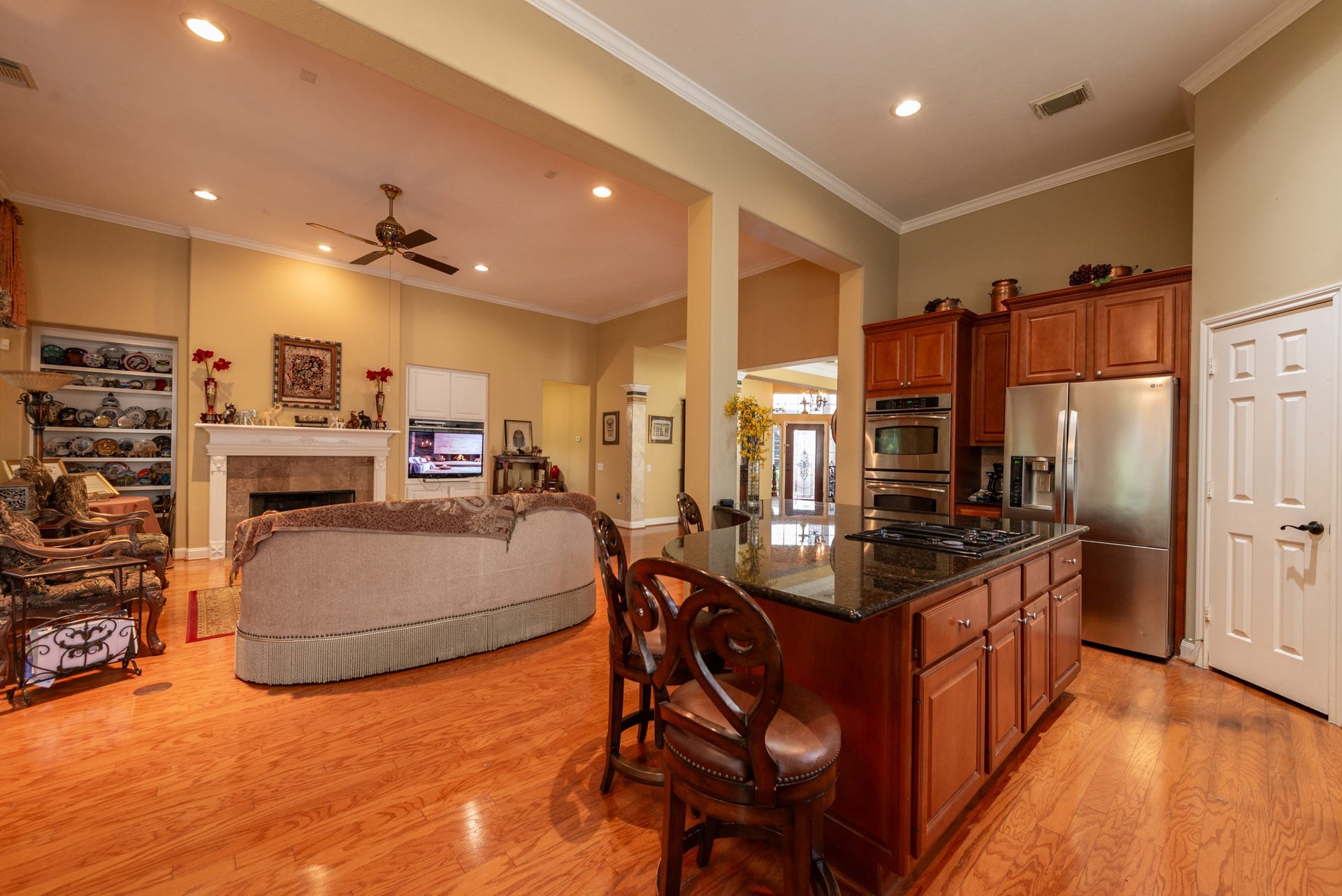 24922 Cinco Manor Lane, Katy, TX 77494 The kitchen offers extensive cabinetry, granite countertops, stainless appliances and plenty of prep and storage space.