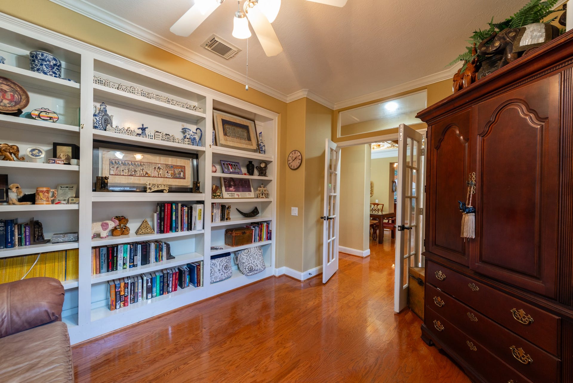 24922 Cinco Manor Lane, Katy, TX 77494 Another view of the study highlighting the extensive built-in shelving and French doors opening to the main living areas.