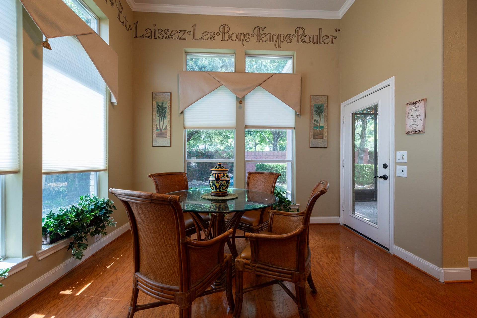 24922 Cinco Manor Lane, Katy, TX 77494 Sun-filled breakfast area surrounded by tall windows with direct access to the outdoor living space.