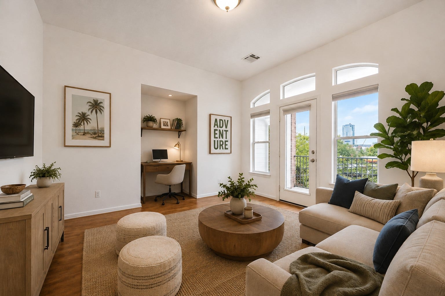 1008 Marconi Street, #A, Houston, TX 77019 Spacious game room/loft with soaring ceilings and an abundance of natural light with direct access to extended covered patio balcony with direct views of Downtown. (Digitally staged image.)