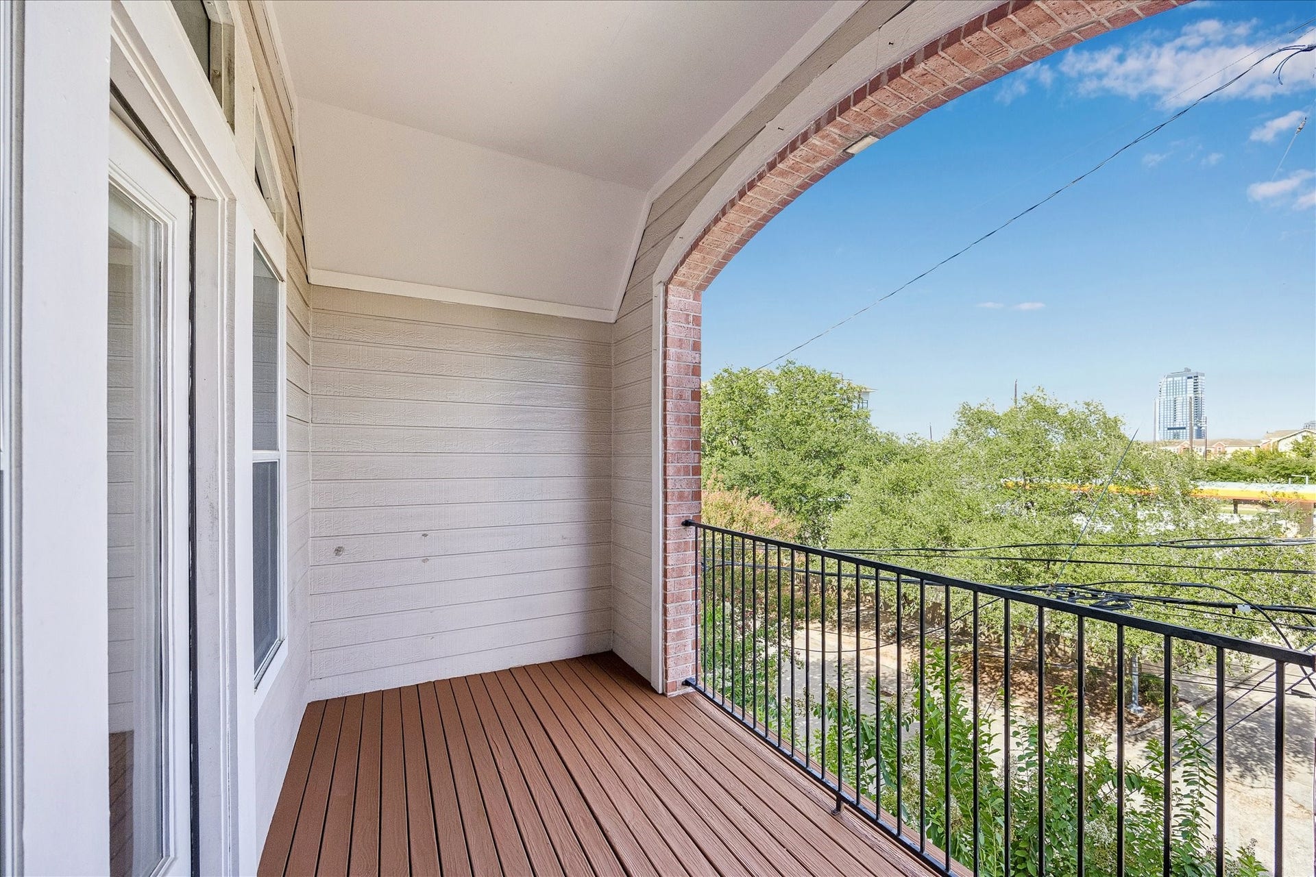 1008 Marconi Street, #A, Houston, TX 77019 Extended covered patio balcony - The perfect spot to enjoy skyline views.