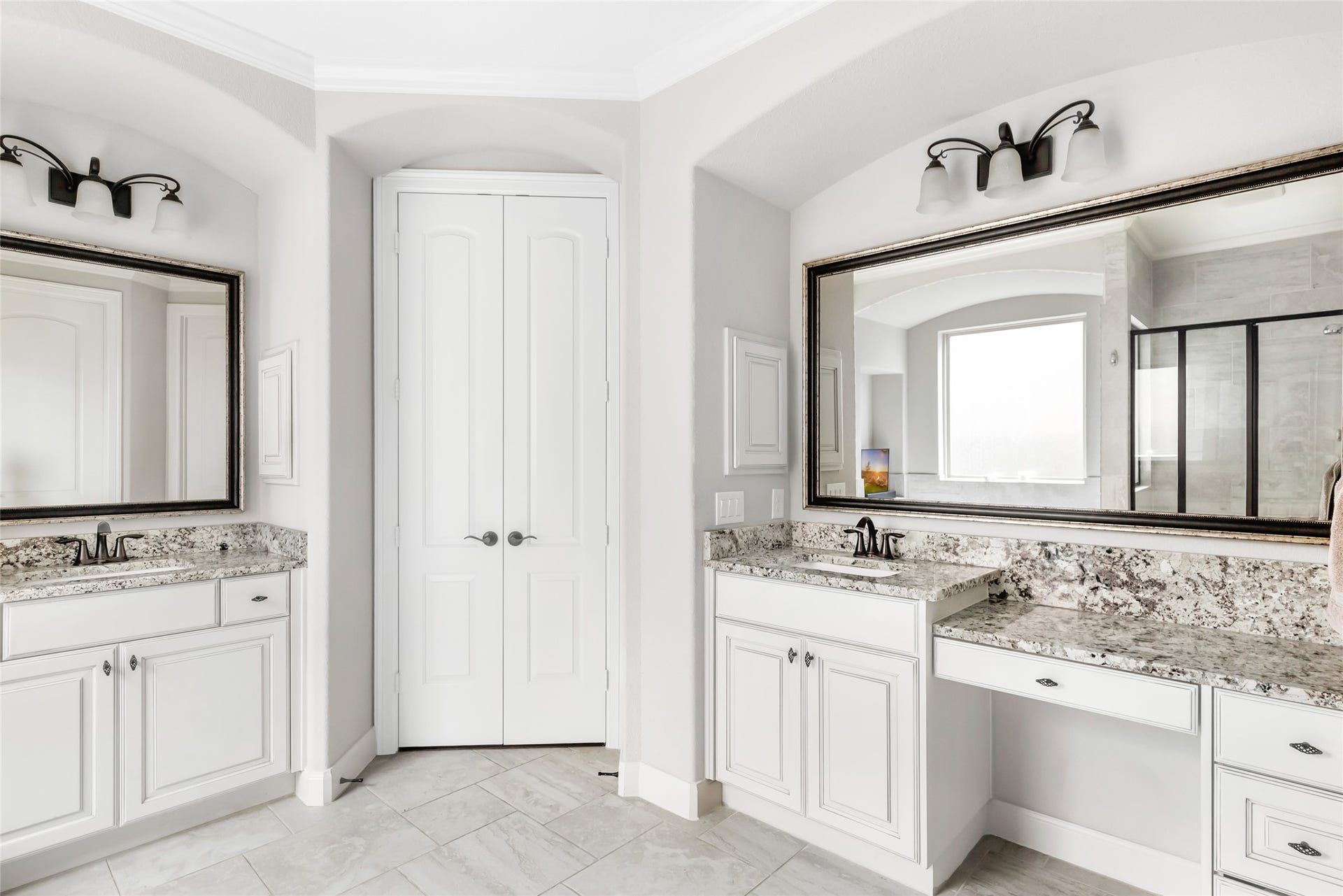 18931 Wild Thornberry Drive, Tomball, TX 77377 Double vanities w/ vanity area, framed mirrors, and beautiful granite