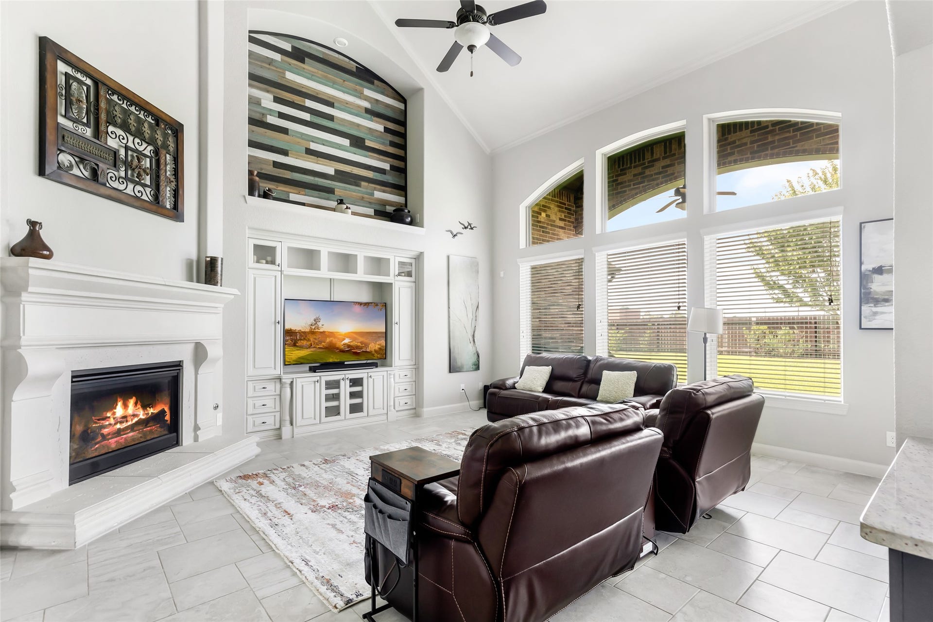 18931 Wild Thornberry Drive, Tomball, TX 77377 Large living room with high ceilings, built-ins, and gas fireplace with large mantel ready for decor!