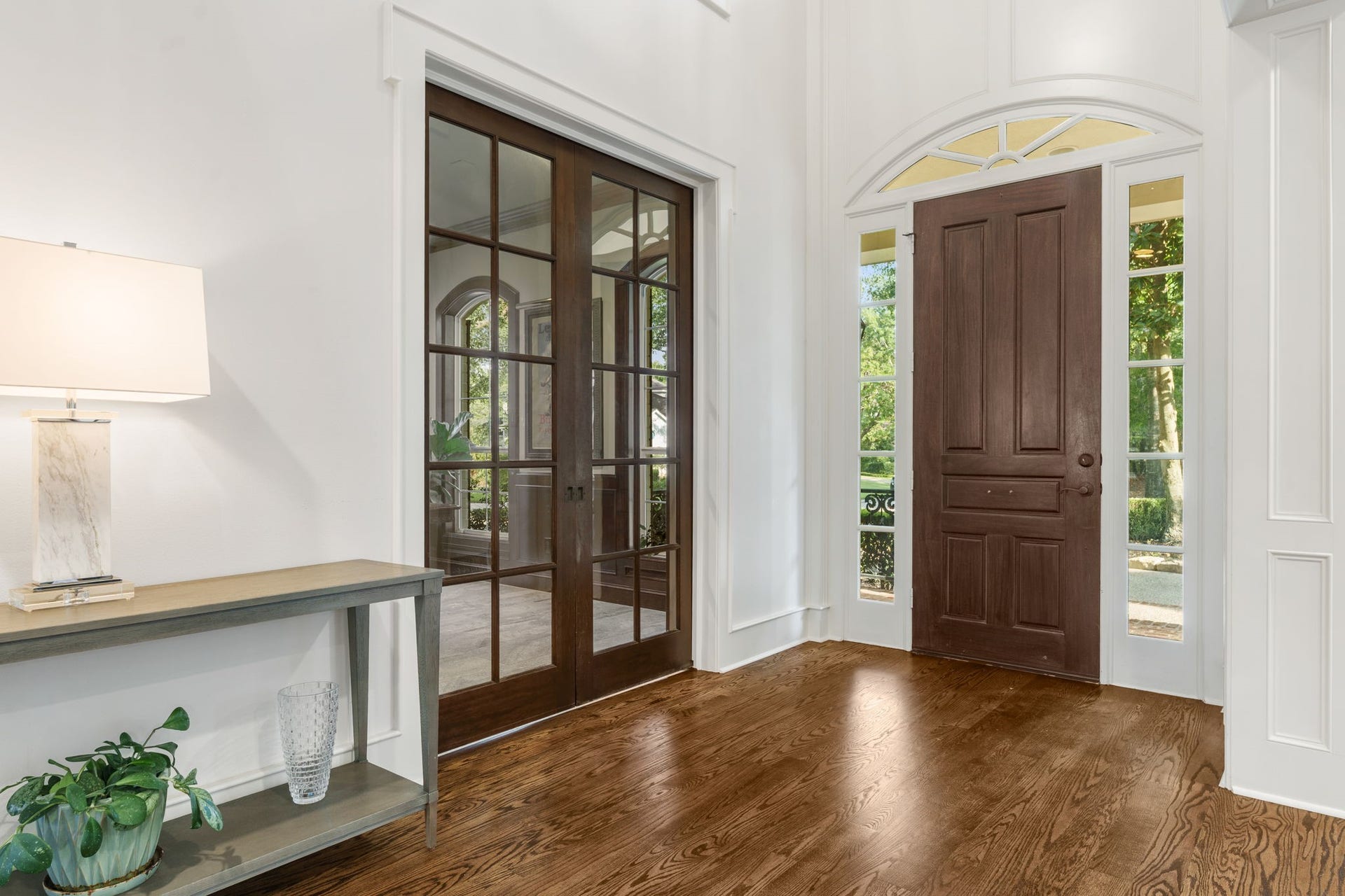 186 Sentinel Point Court, The Woodlands, TX 77382 To the right of the entry, glass front French doors open into a handsome study.