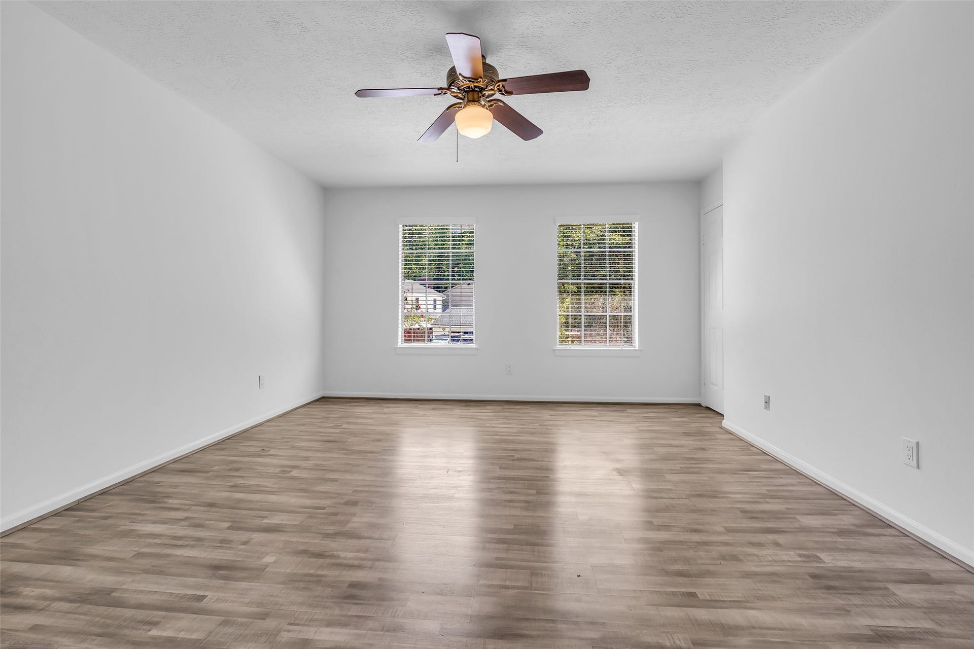 Spacious primary bedroom on 2nd floor offering a comfortable retreat.