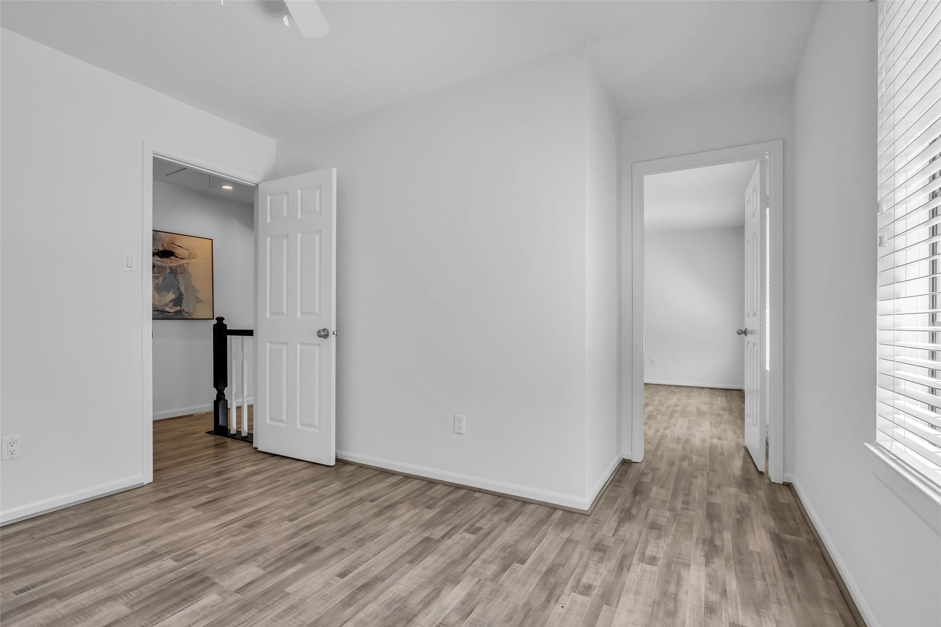 Door between primary bedroom to secondary bedroom- perfect for nursery/office/flex room!