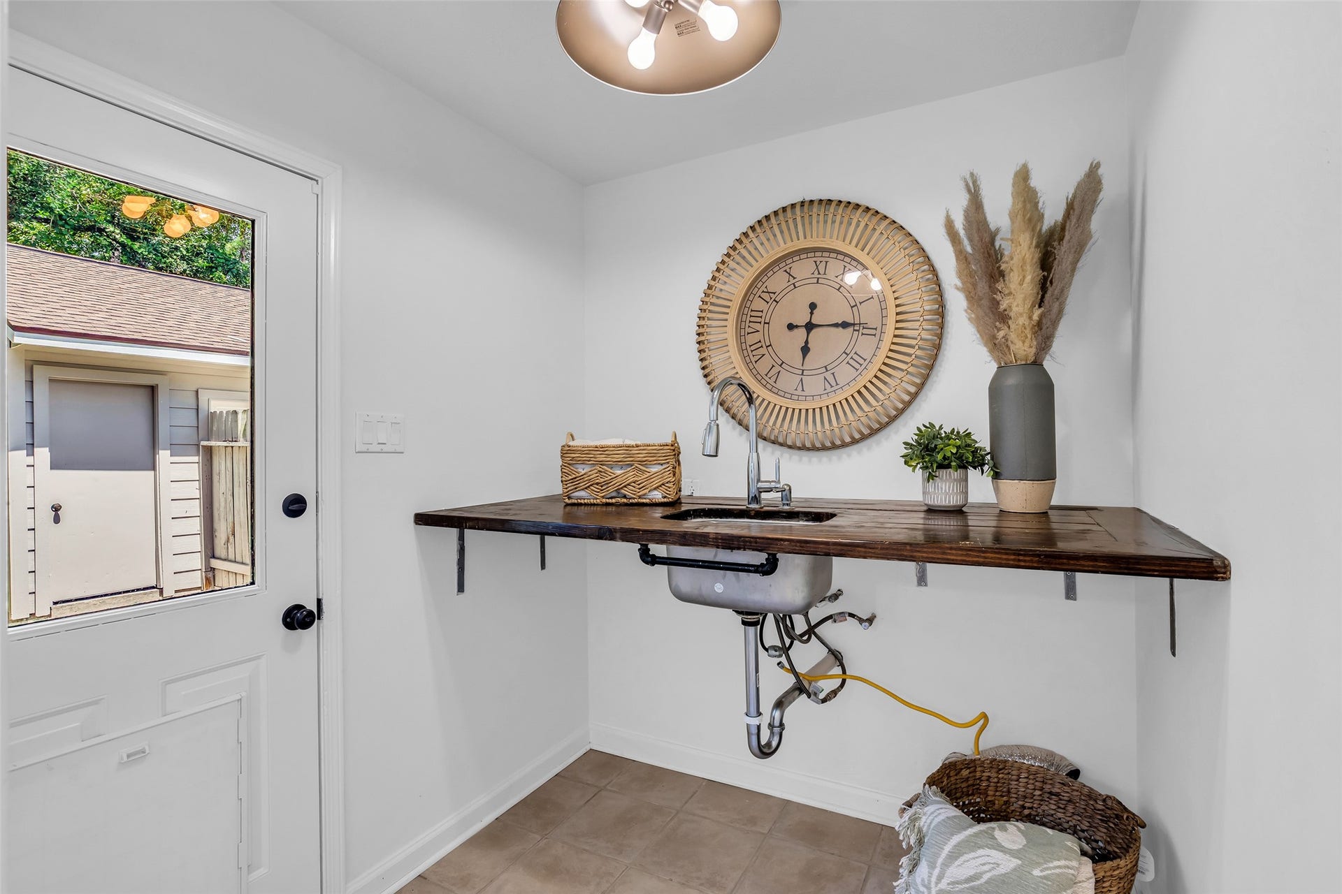 Convenient Laundry room with utility sink