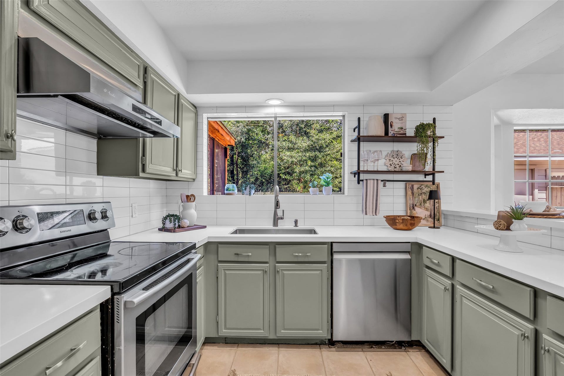 Beautiful view of the backyard/greenspace from the kitchen.