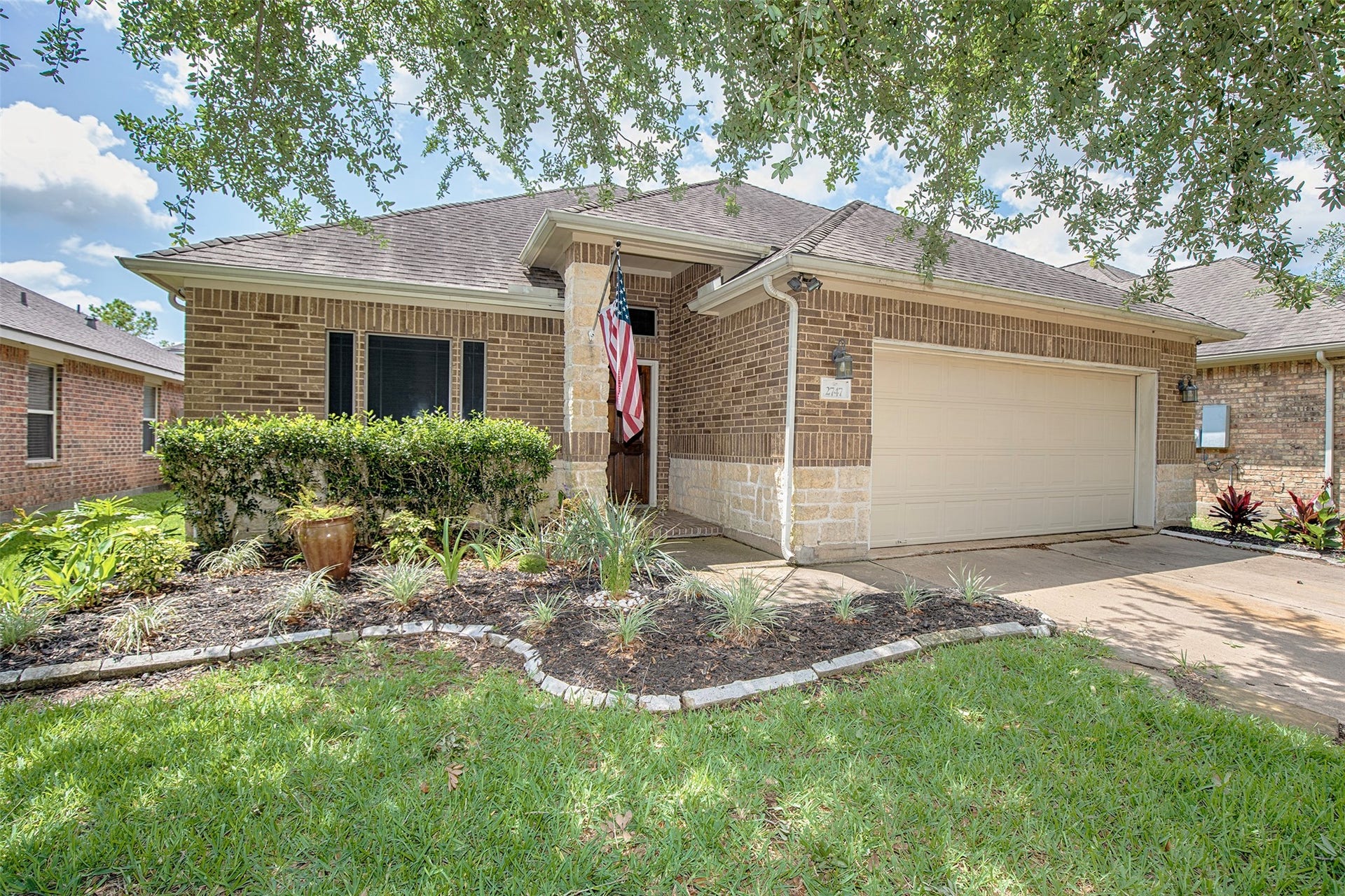 2747 Villa Bella Court, League City, TX 77573 This beautiful home for lease features a striking stone elevation that adds timeless curb appeal and character.