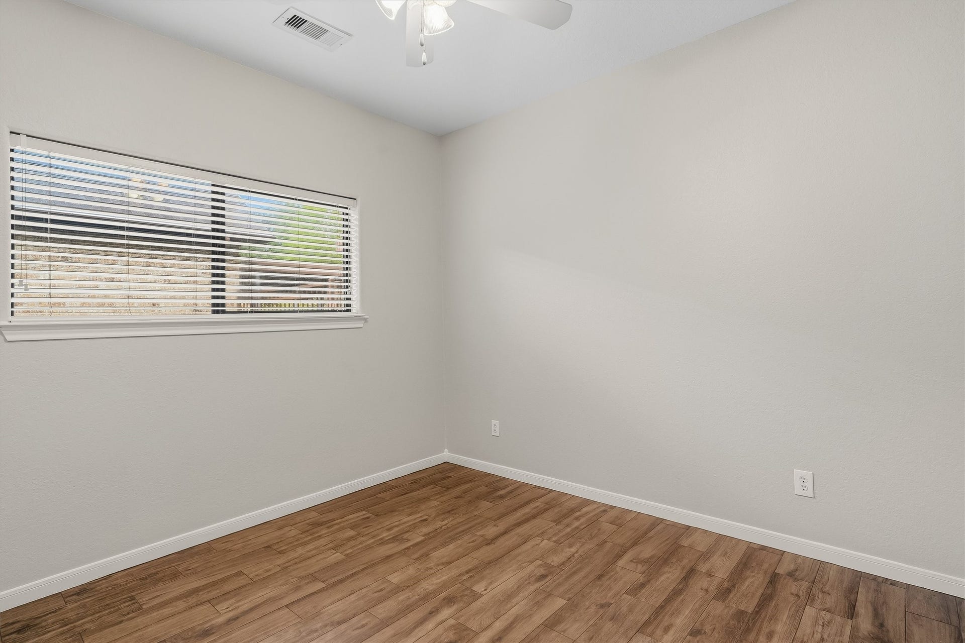 304 Reppert Street, Bacliff, TX 77518 Second bedroom, fresh paint and updated flooring