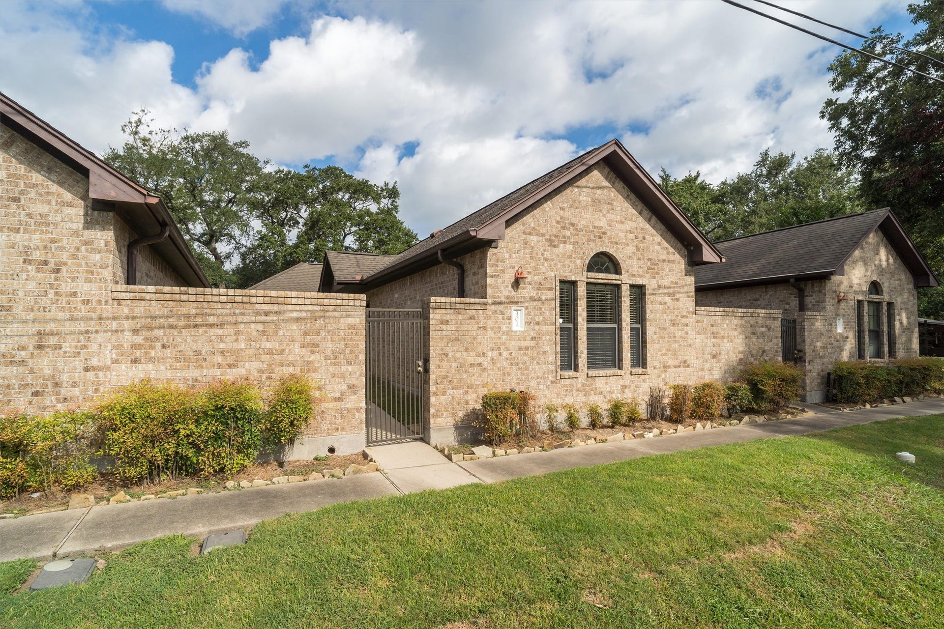 304 Reppert Street, Bacliff, TX 77518 Private and gated courtyard area with patio at entrance