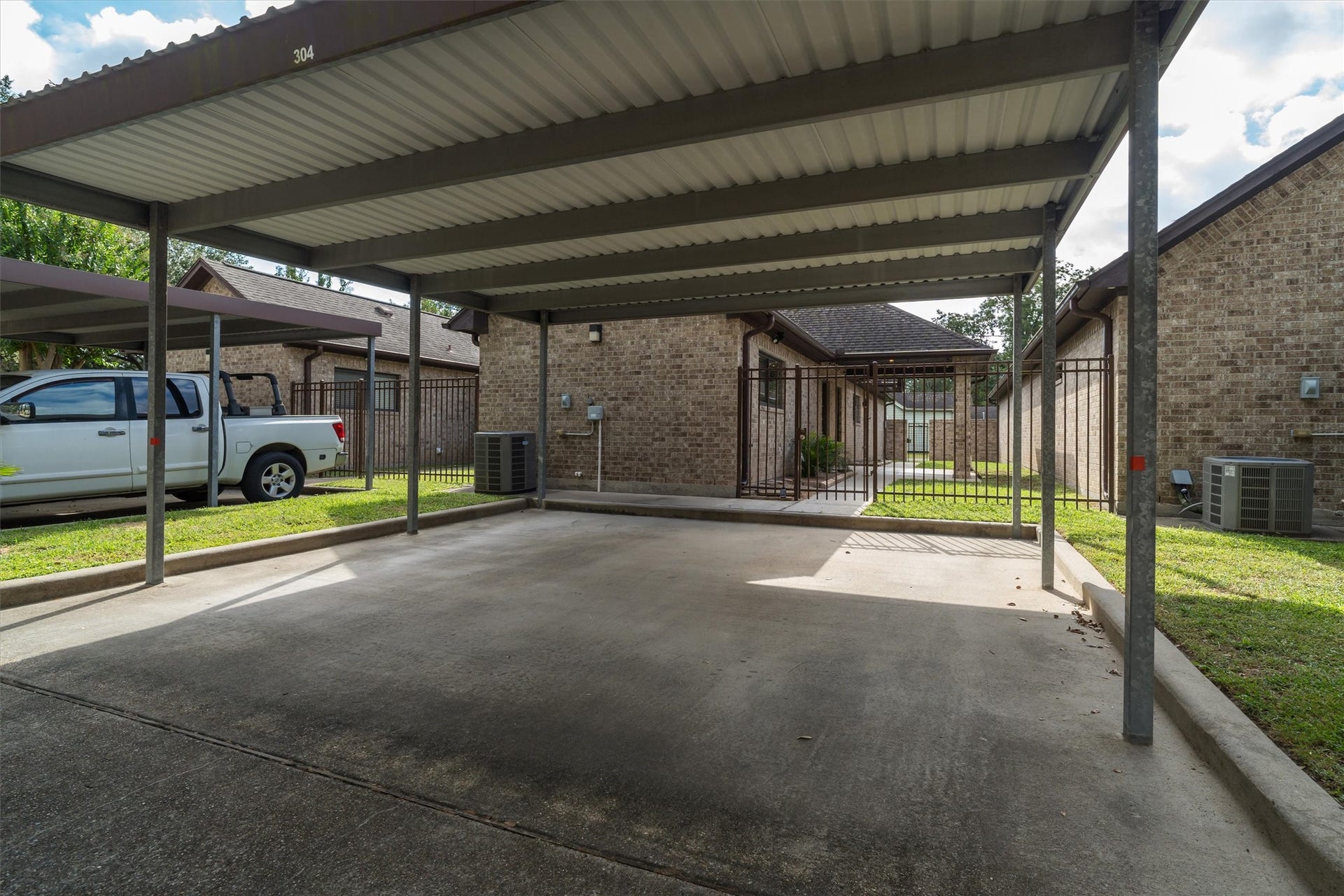304 Reppert Street, Bacliff, TX 77518 Two car carport