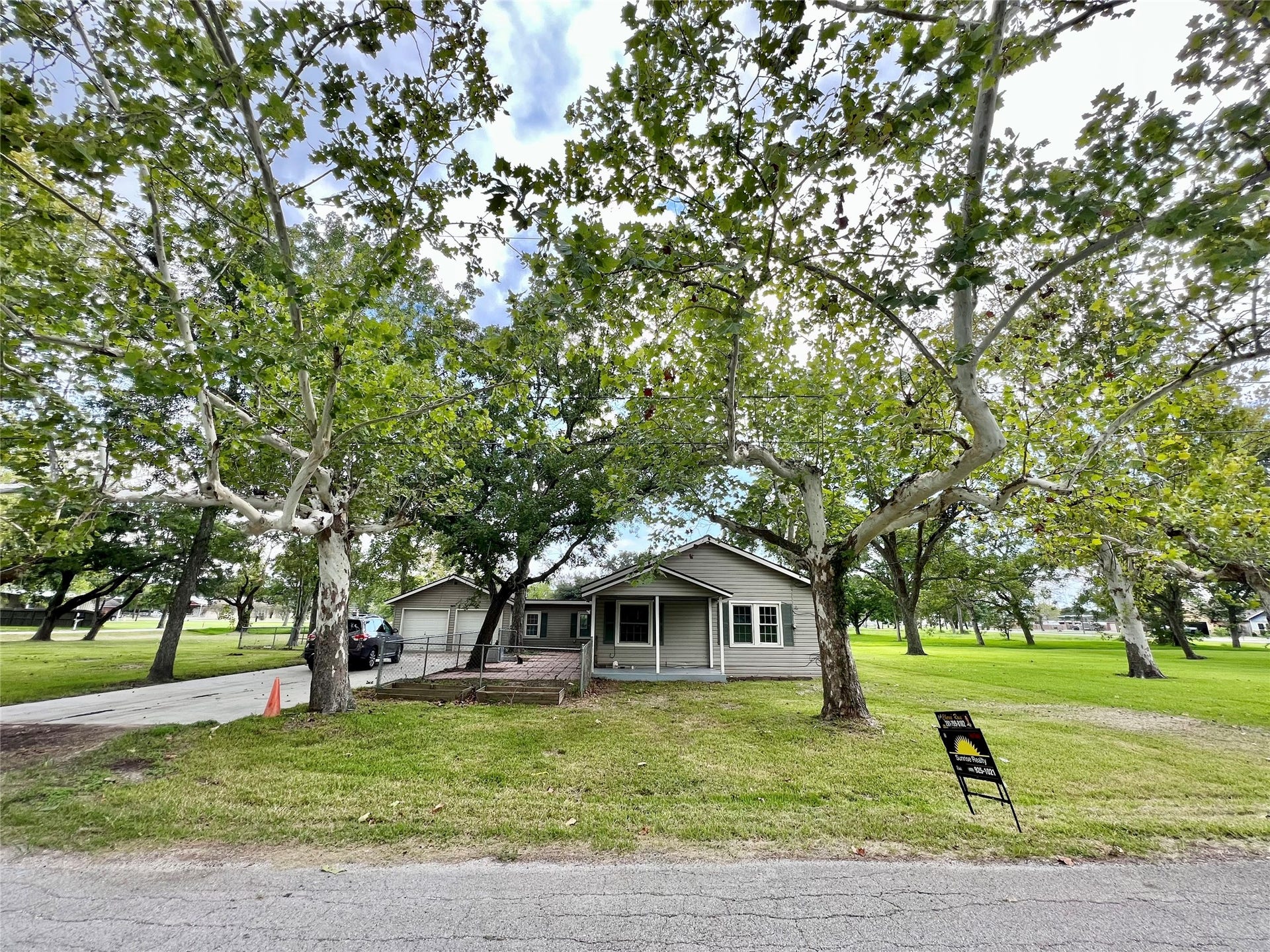 14414 2nd Street Street, Santa Fe, TX 77517 This is a nice home in the heart of Santa Fe at a reasonable price on one of the prettiest oversized corner lots around with "city services" so you don't even have to worry about well and septic issues. Book your appointment soon!