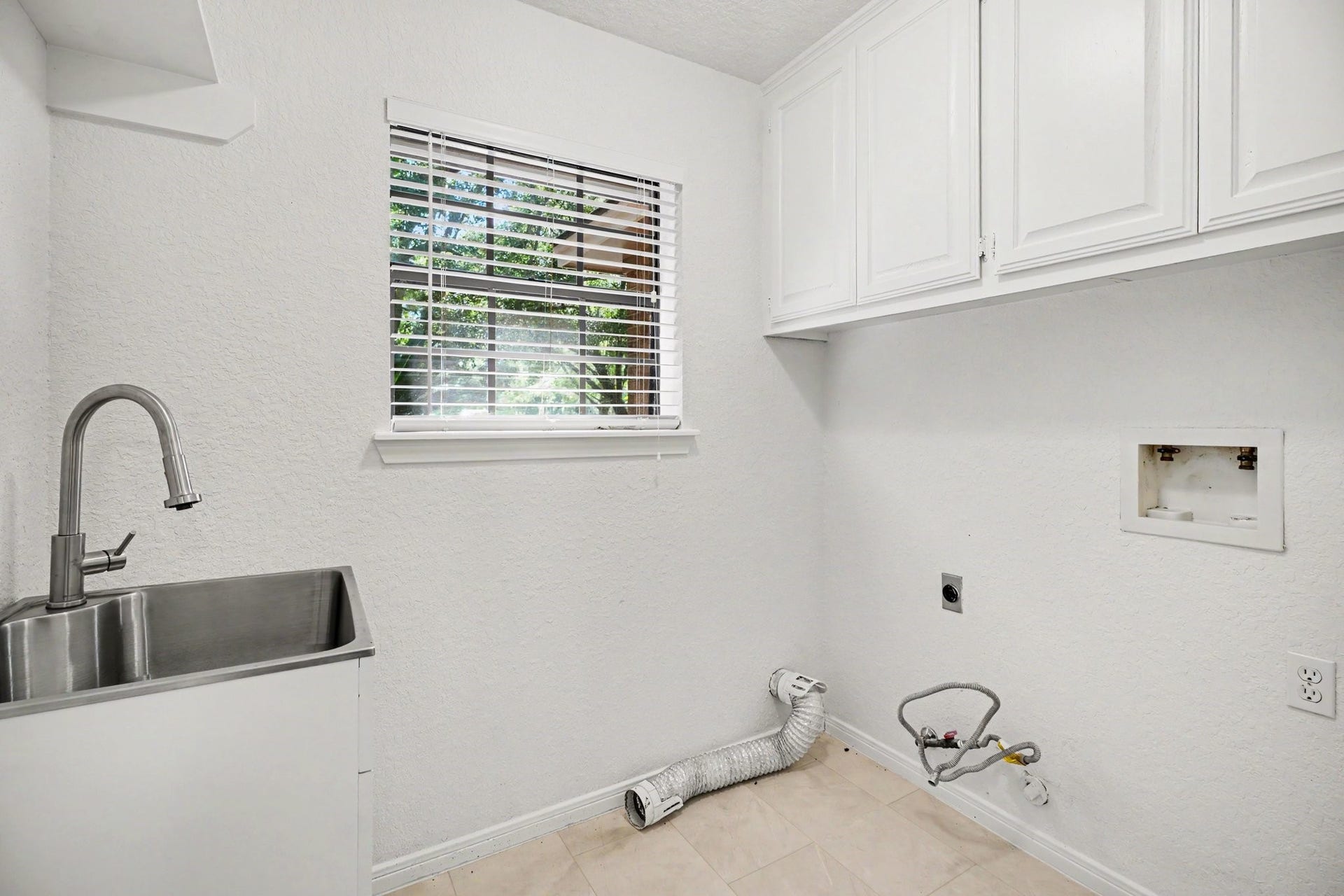 3320 Tower Road, Santa Fe, TX 77517 Utility Room with Mop Sink