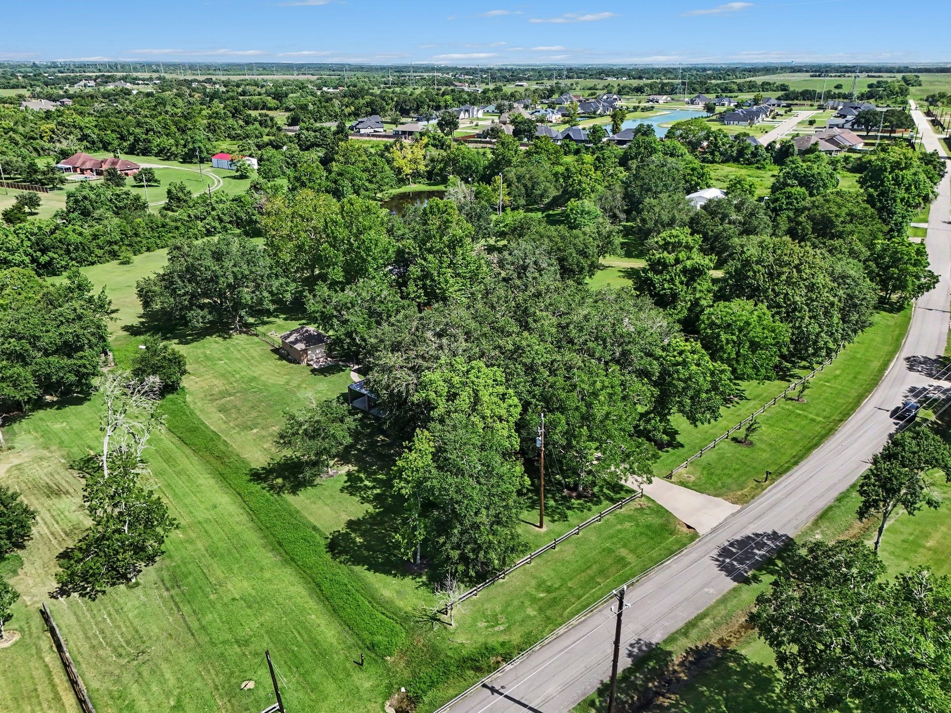 3320 Tower Road, Santa Fe, TX 77517 Property goes 10ft from Fence Line on the Left back to 3rd Tree Line