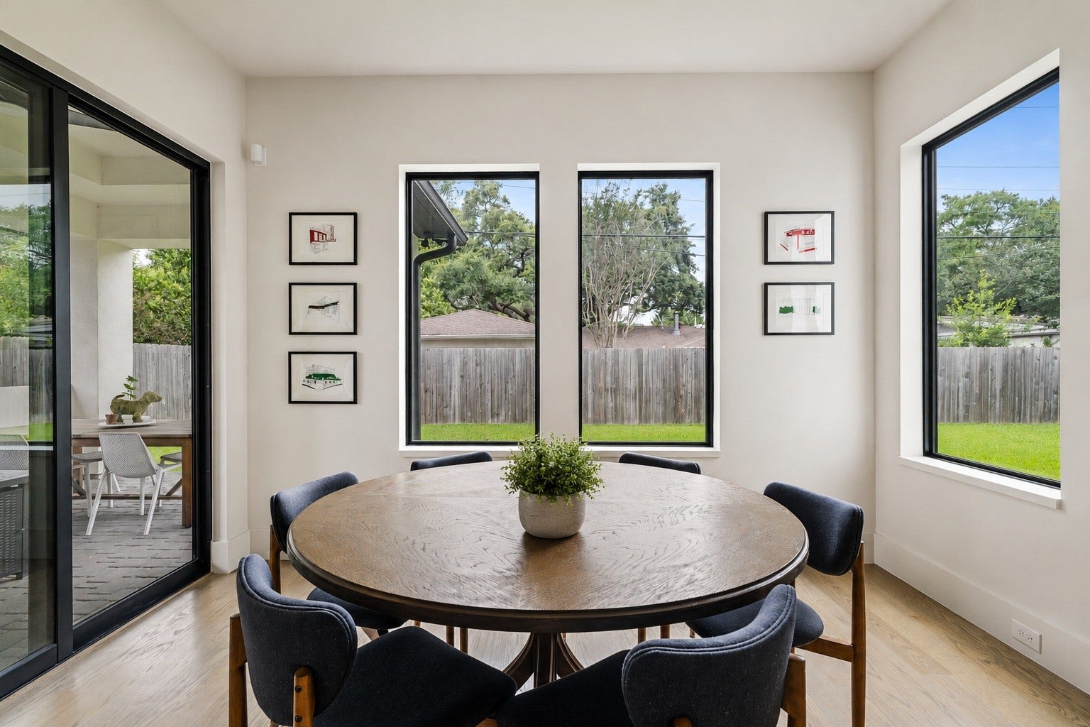 4638 Merwin Street, Houston, TX 77027 The breakfast room is surrounded by large windows.
