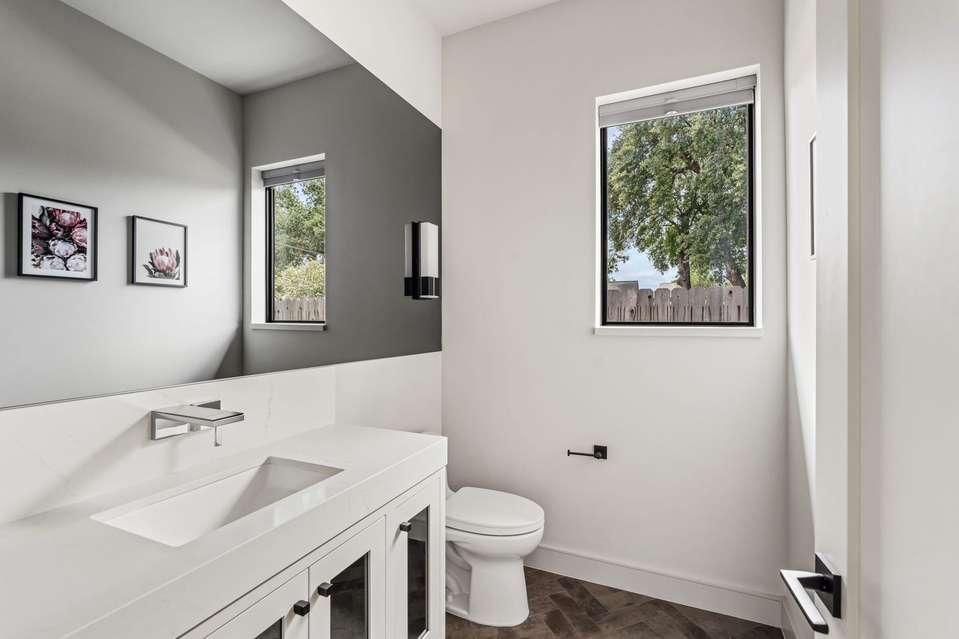 4638 Merwin Street, Houston, TX 77027 Conveniently located on the first floor, the powder bath has waterfall faucets and is thoughtfully designed for guests and offers quick access to the backyard, ideal for a future pool bath.
