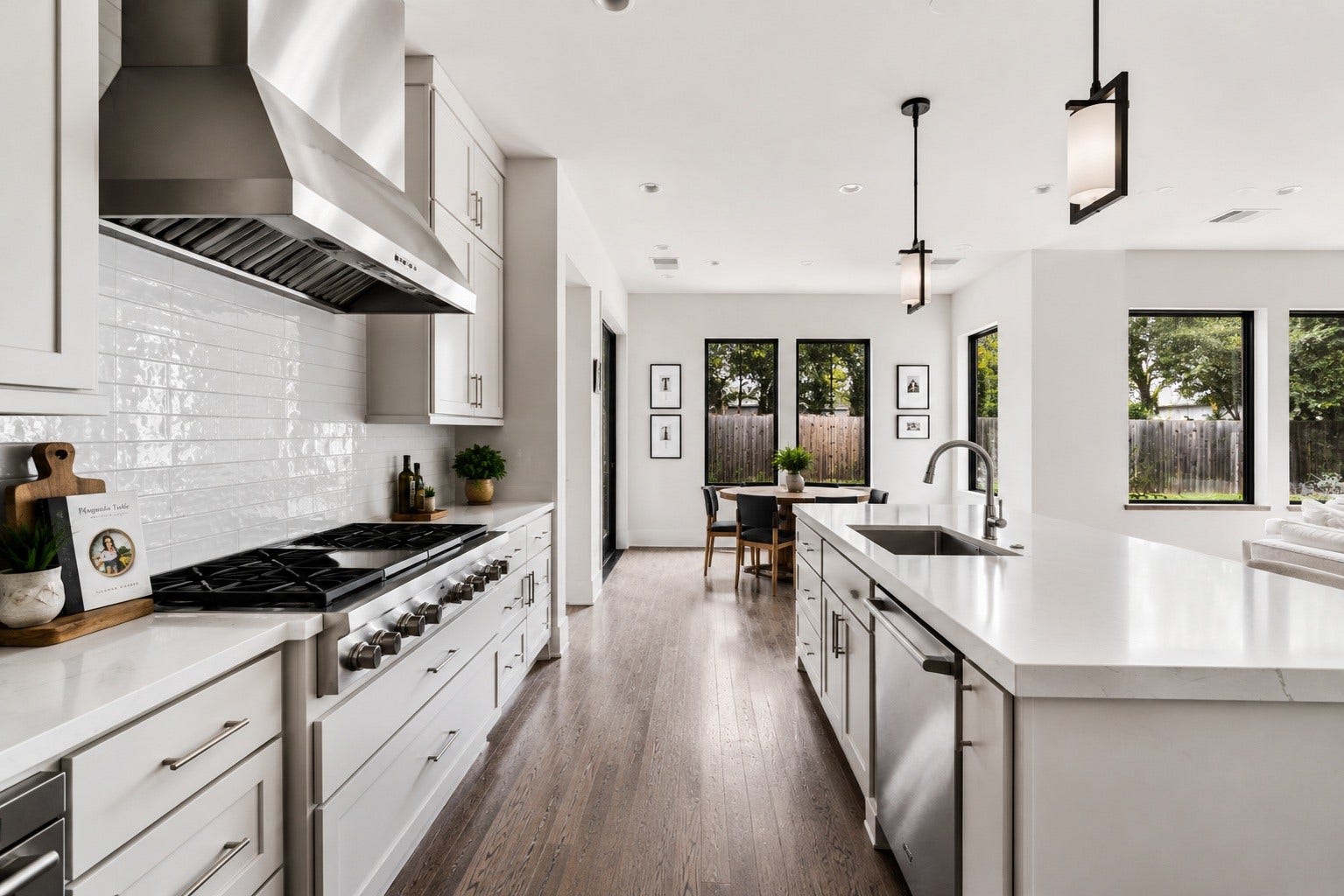 4638 Merwin Street, Houston, TX 77027 Kitchen features a built-in beverage station with a beverage refrigerator and integrated wine storage.