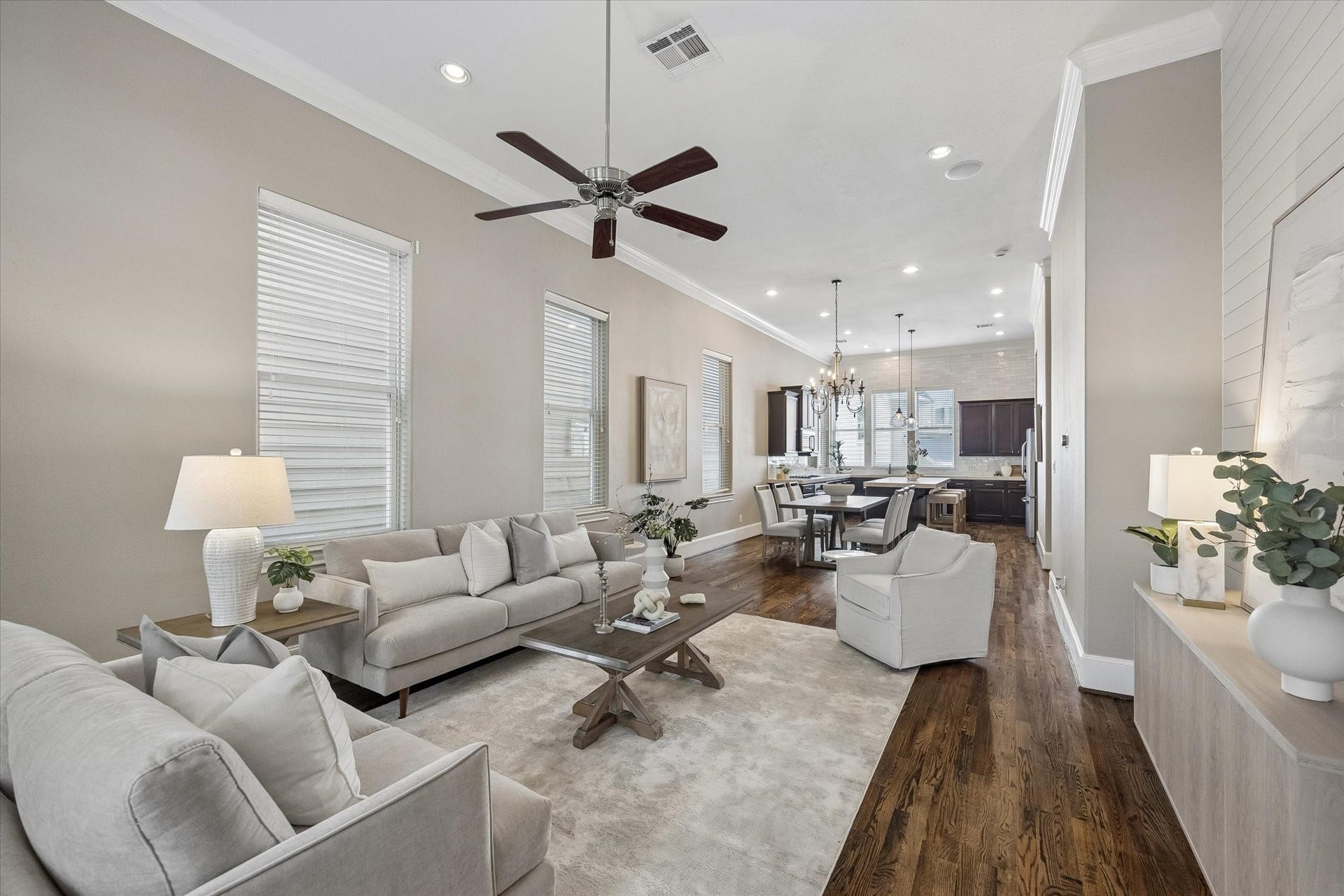 8805 Kolbe Bend Lane, Houston, TX 77080 Expansive second-floor living space with hardwood flooring, high ceilings and multiple windows providing excellent natural light.