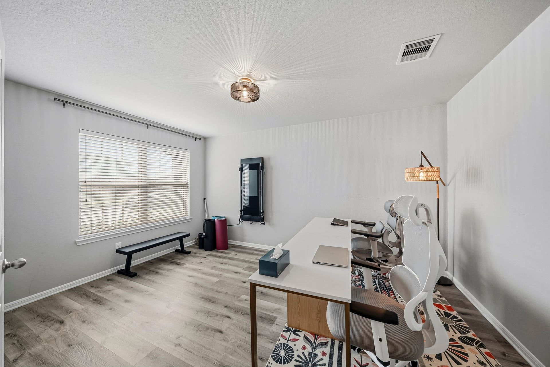 17822 Royal Breccia Lane, Richmond, TX 77407 A spacious, dedicated home office offers a comfortable work-from-home setting with abundant natural light, generous workspace, and room to stay organized.