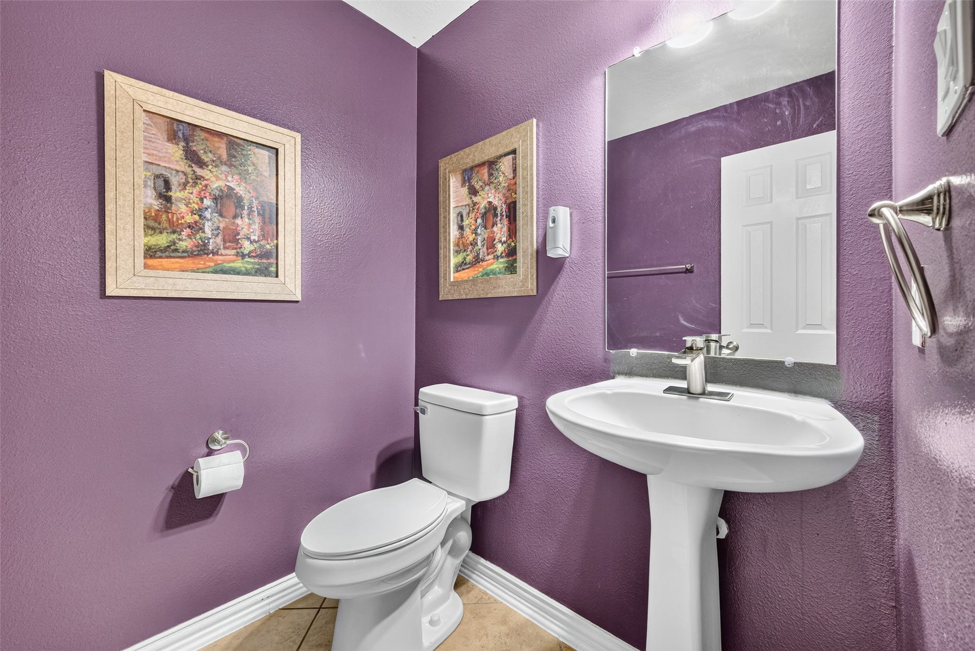 14242 Ashmore Reef Court, Sugar Land, TX 77498 Convenient half bath featuring elegant finishes and a thoughtfully designed layout, perfect for family and guests